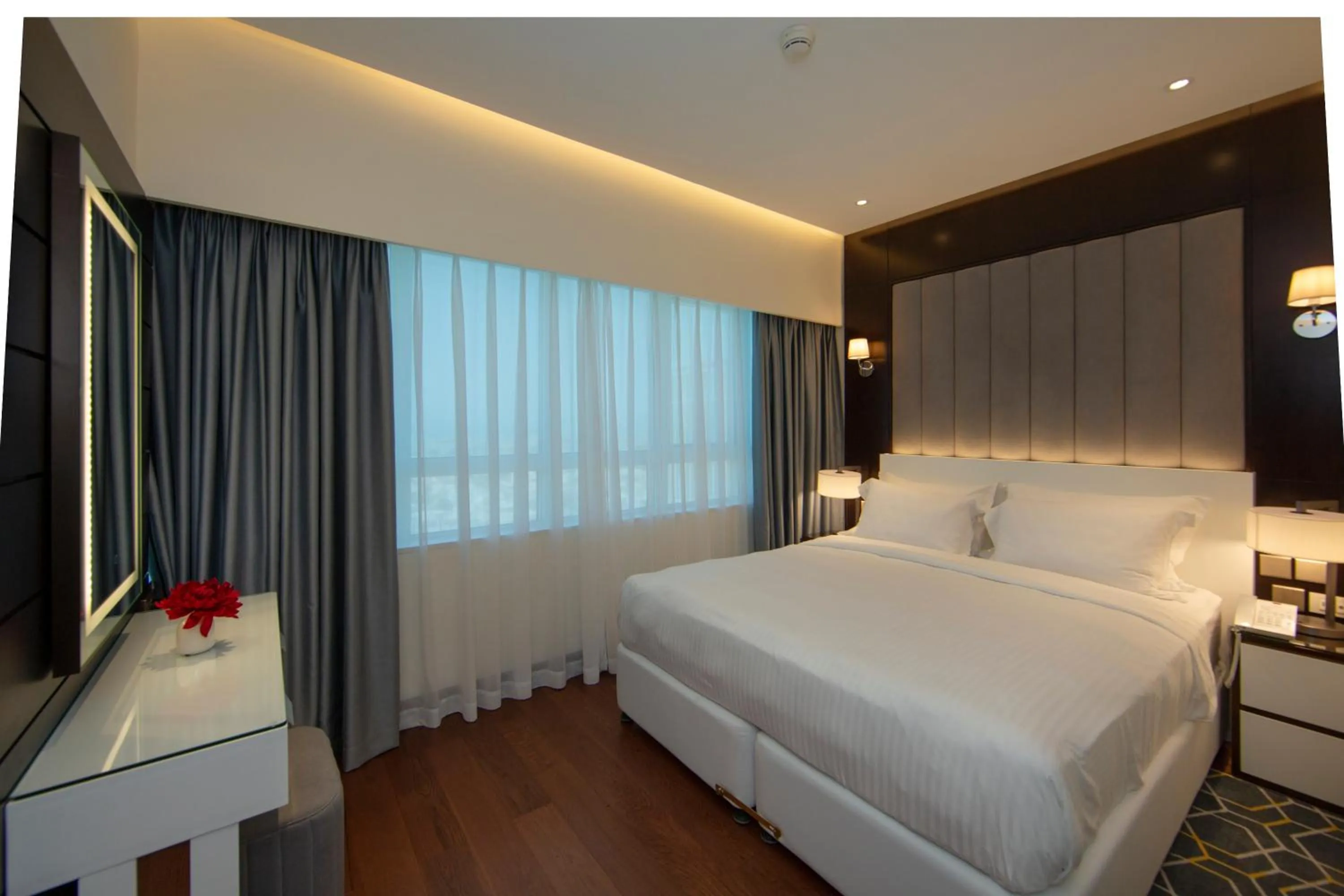 Bed in Number One Tower Suites