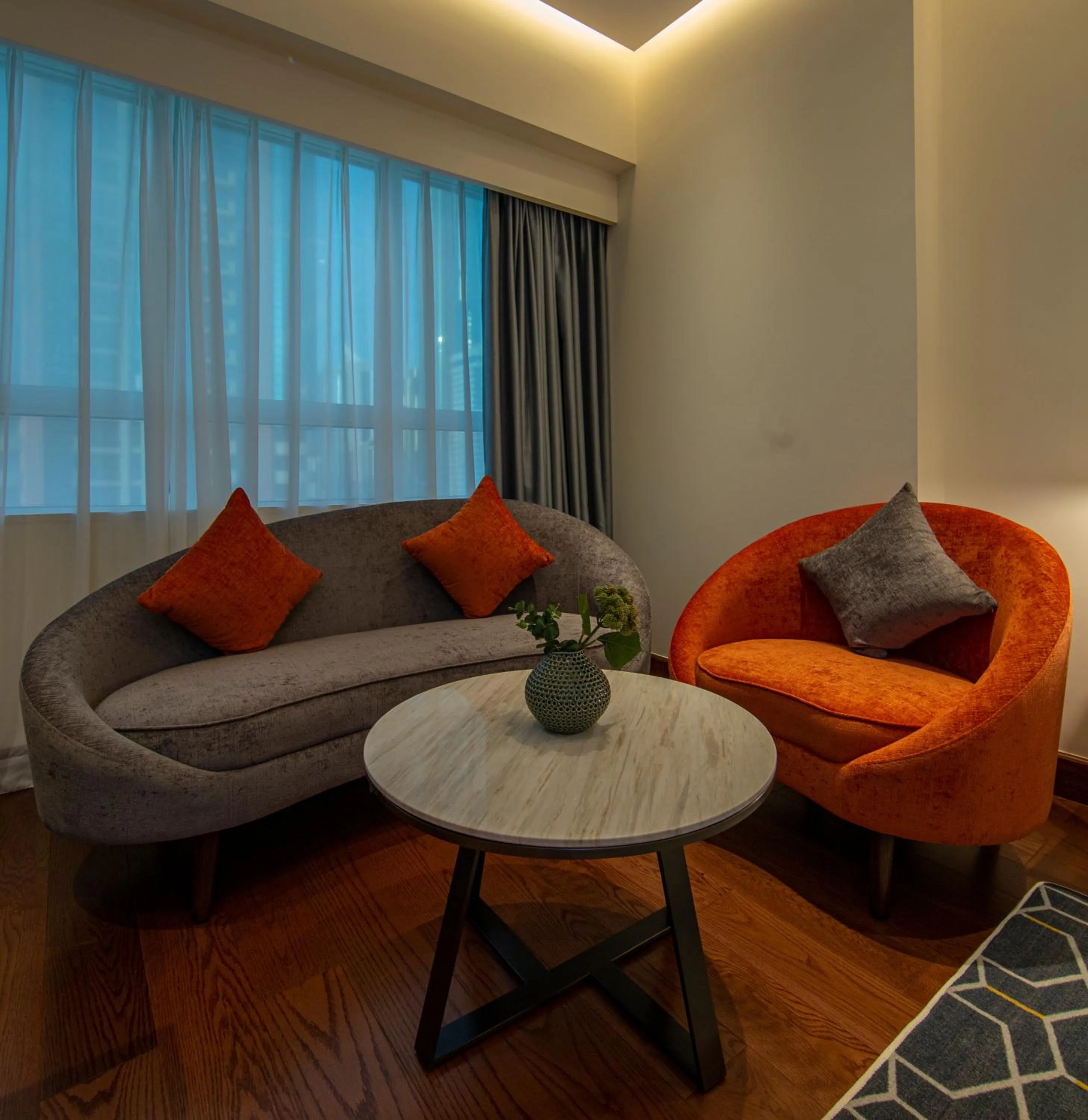 Seating area in Number One Tower Suites