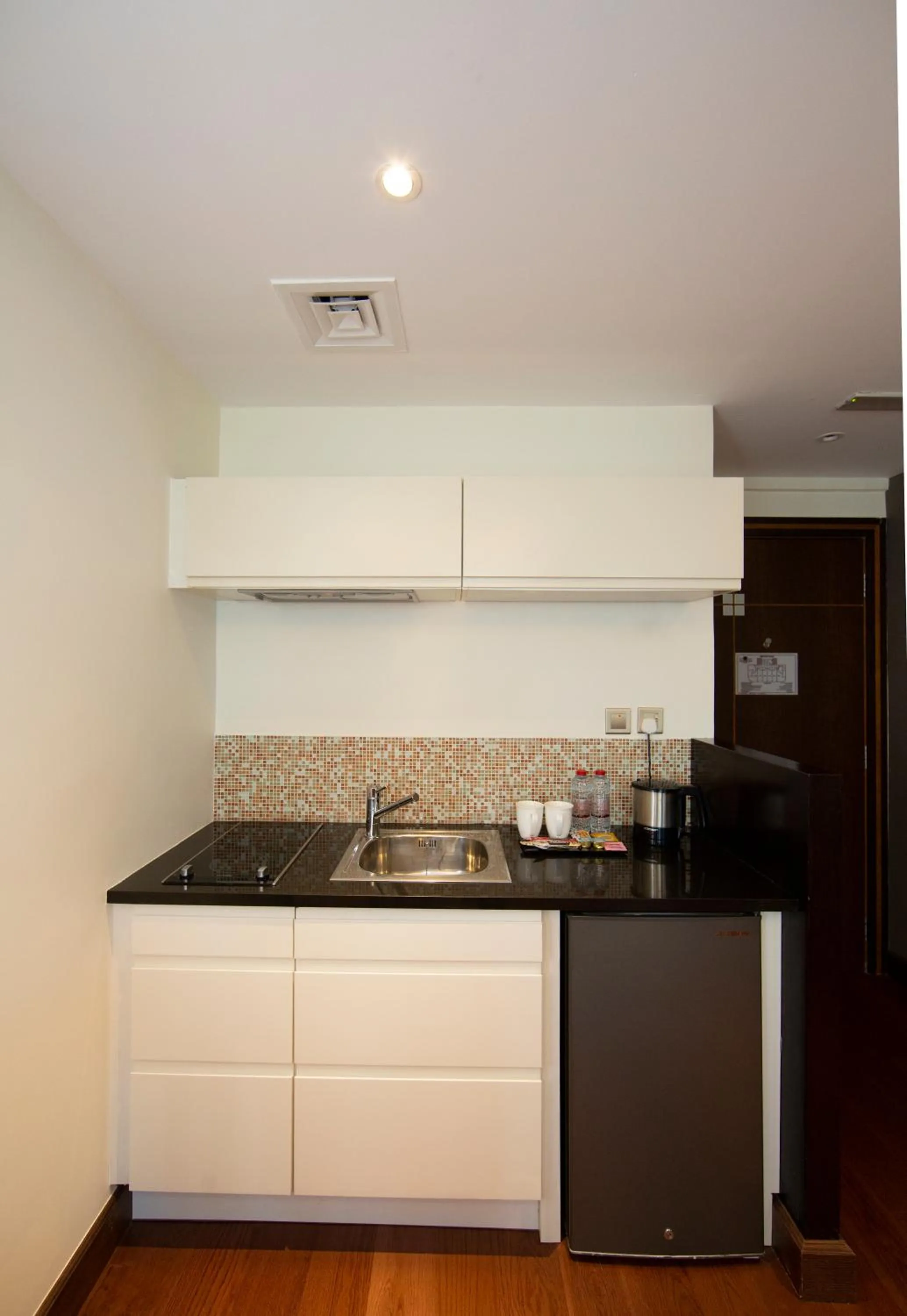 Kitchen or kitchenette in Number One Tower Suites