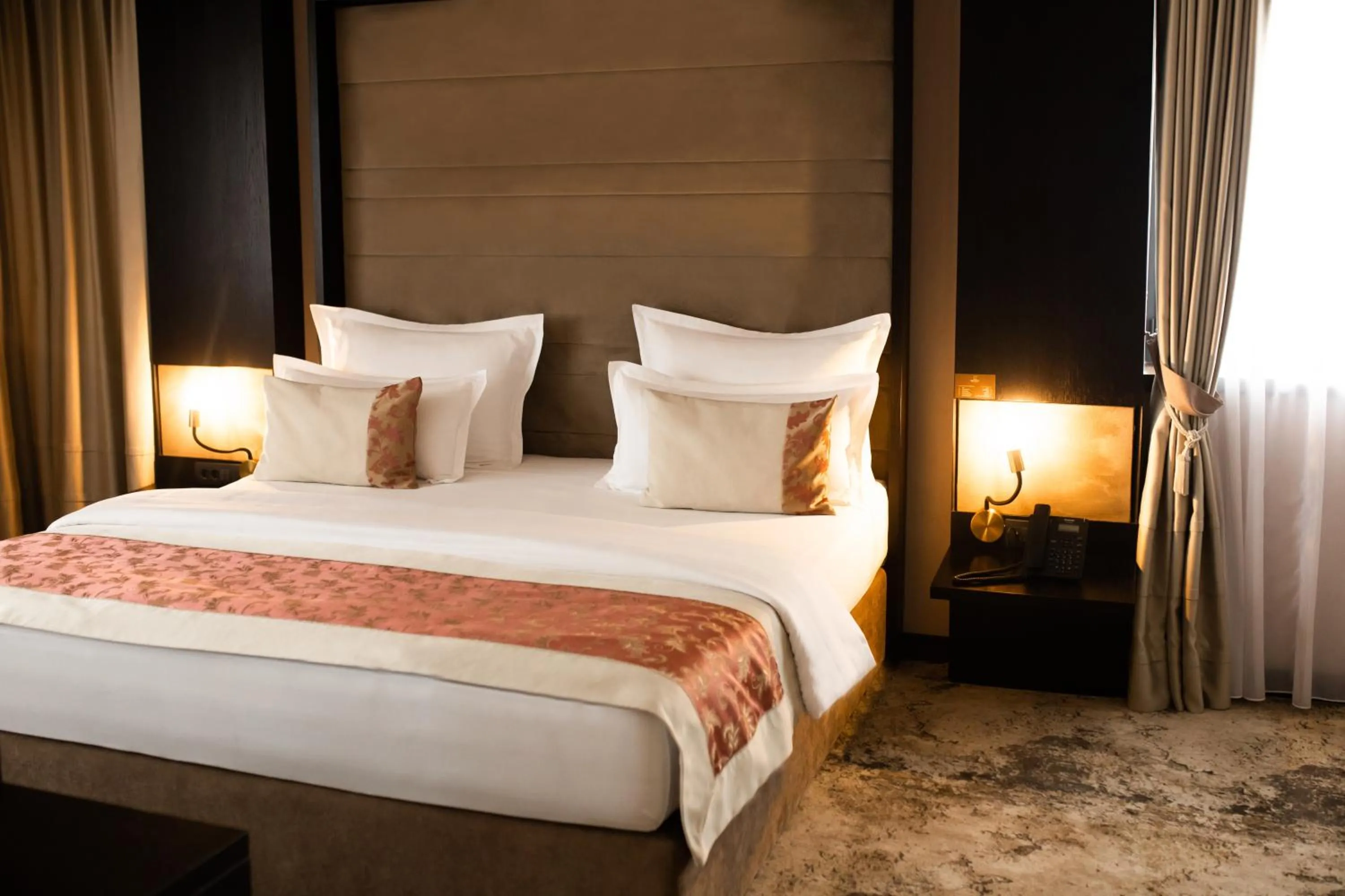 Bed in Malak Regency Hotel