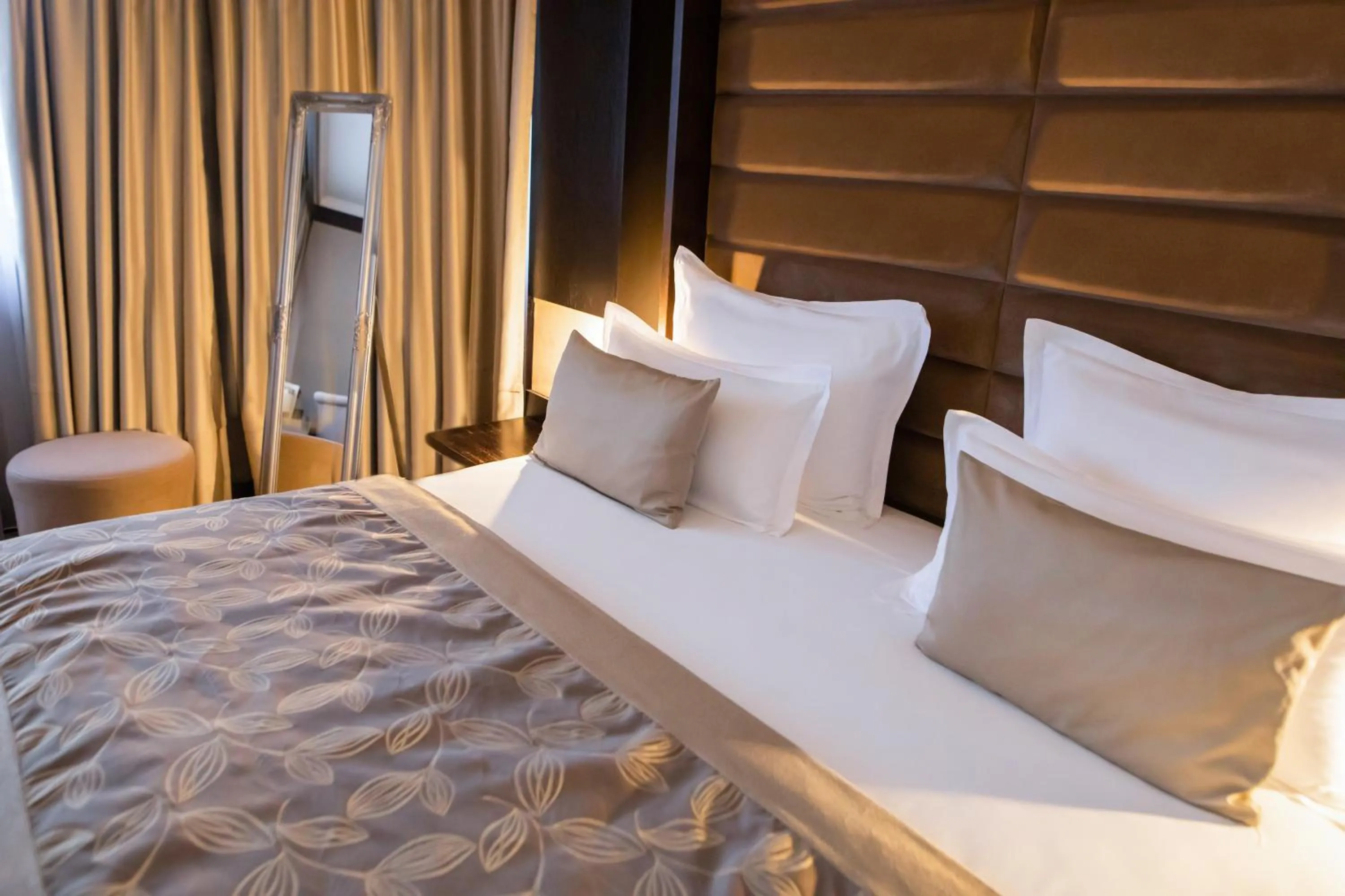 Bed in Malak Regency Hotel