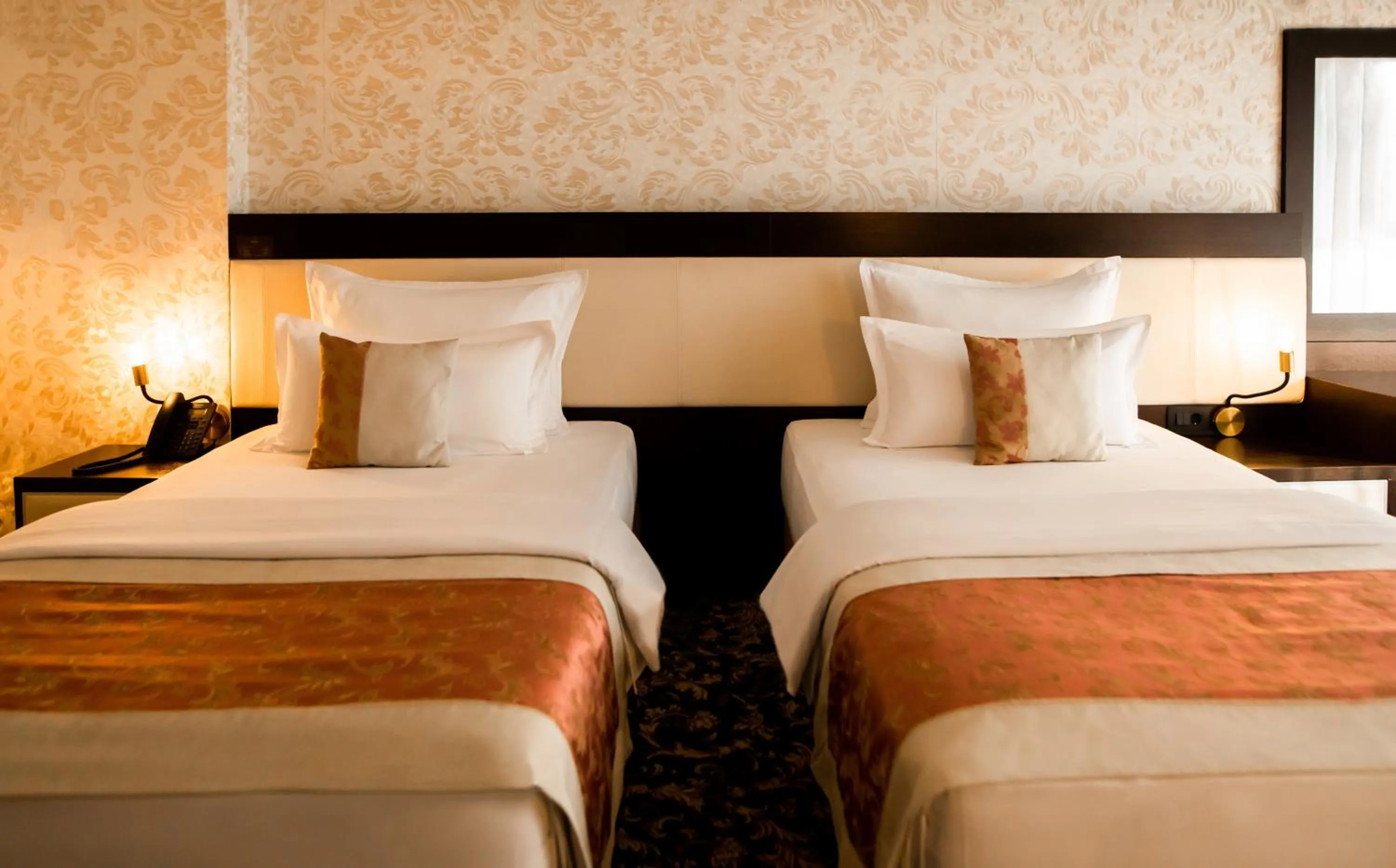 Bed in Malak Regency Hotel