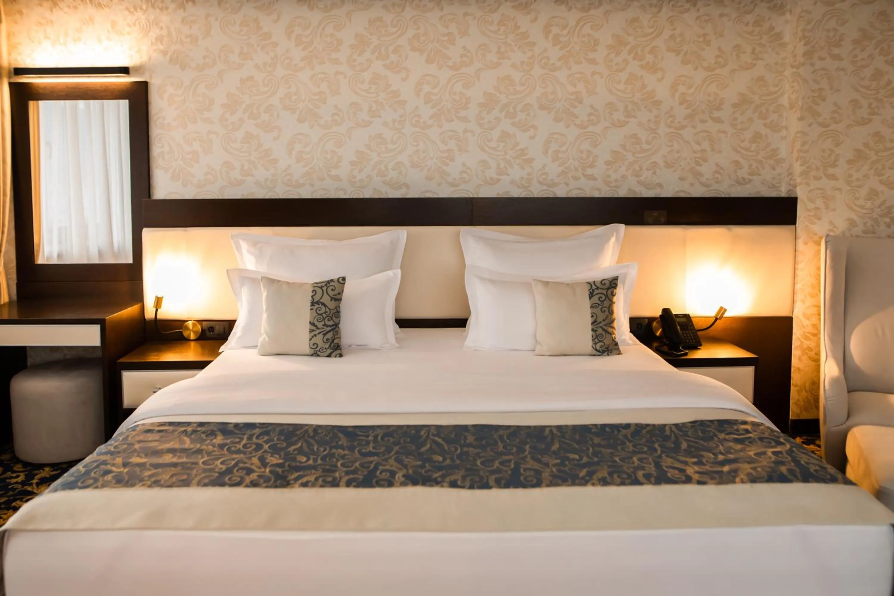 Bed in Malak Regency Hotel