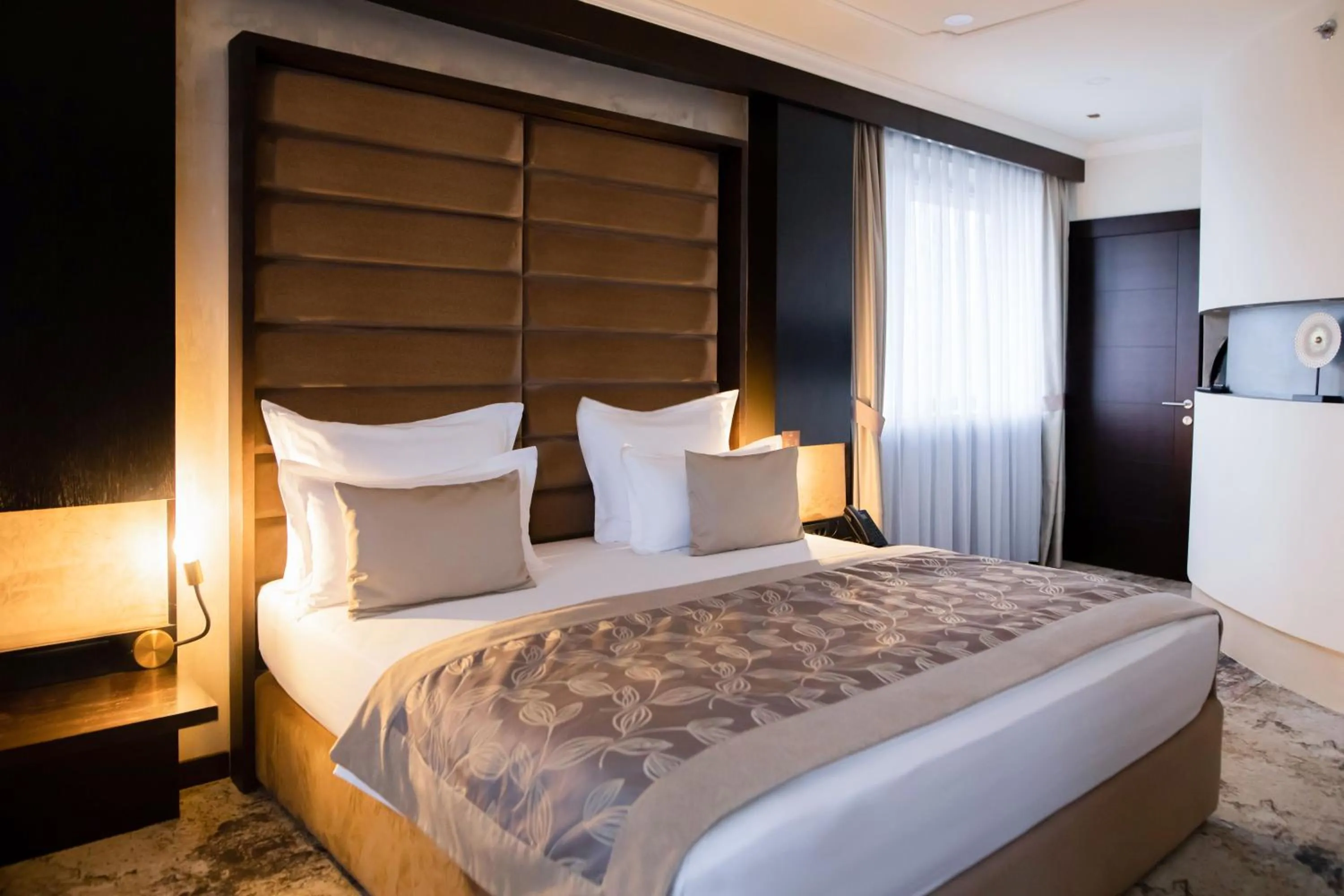 Bed in Malak Regency Hotel