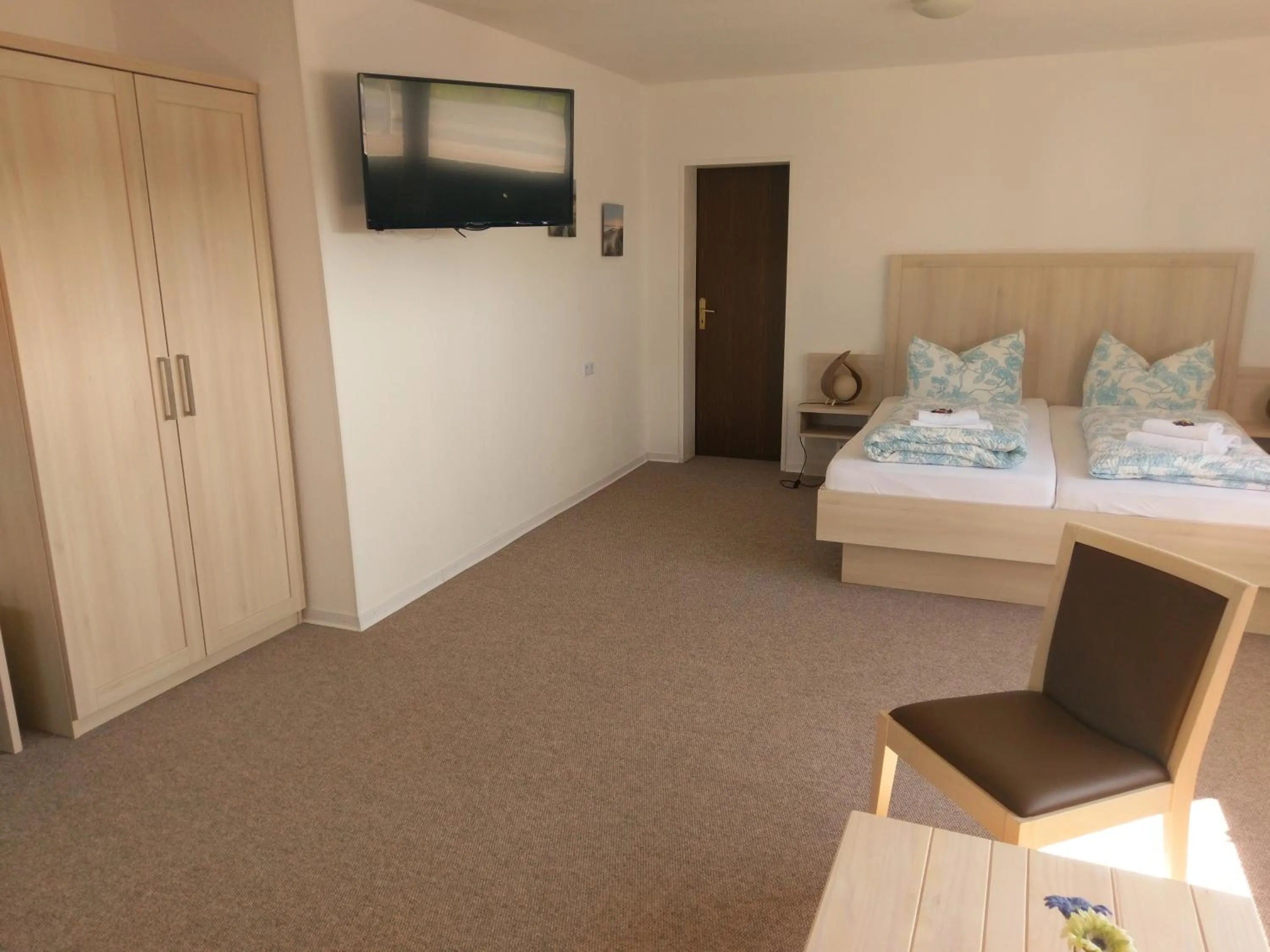Photo of the whole room, Bed in Hotel Nordseegruß