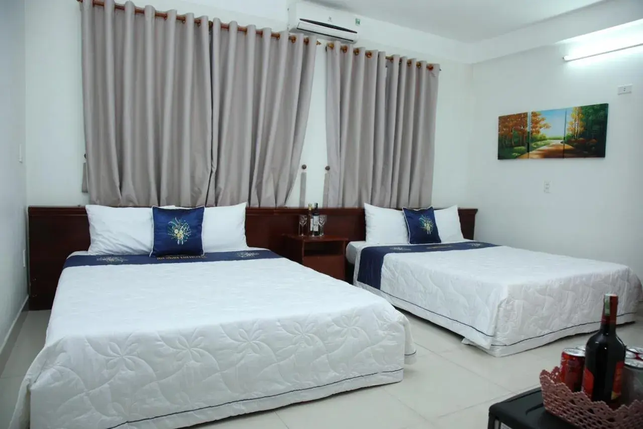 Bed in An Bình Tài Hotel Bed in An Bình Tài Hotel