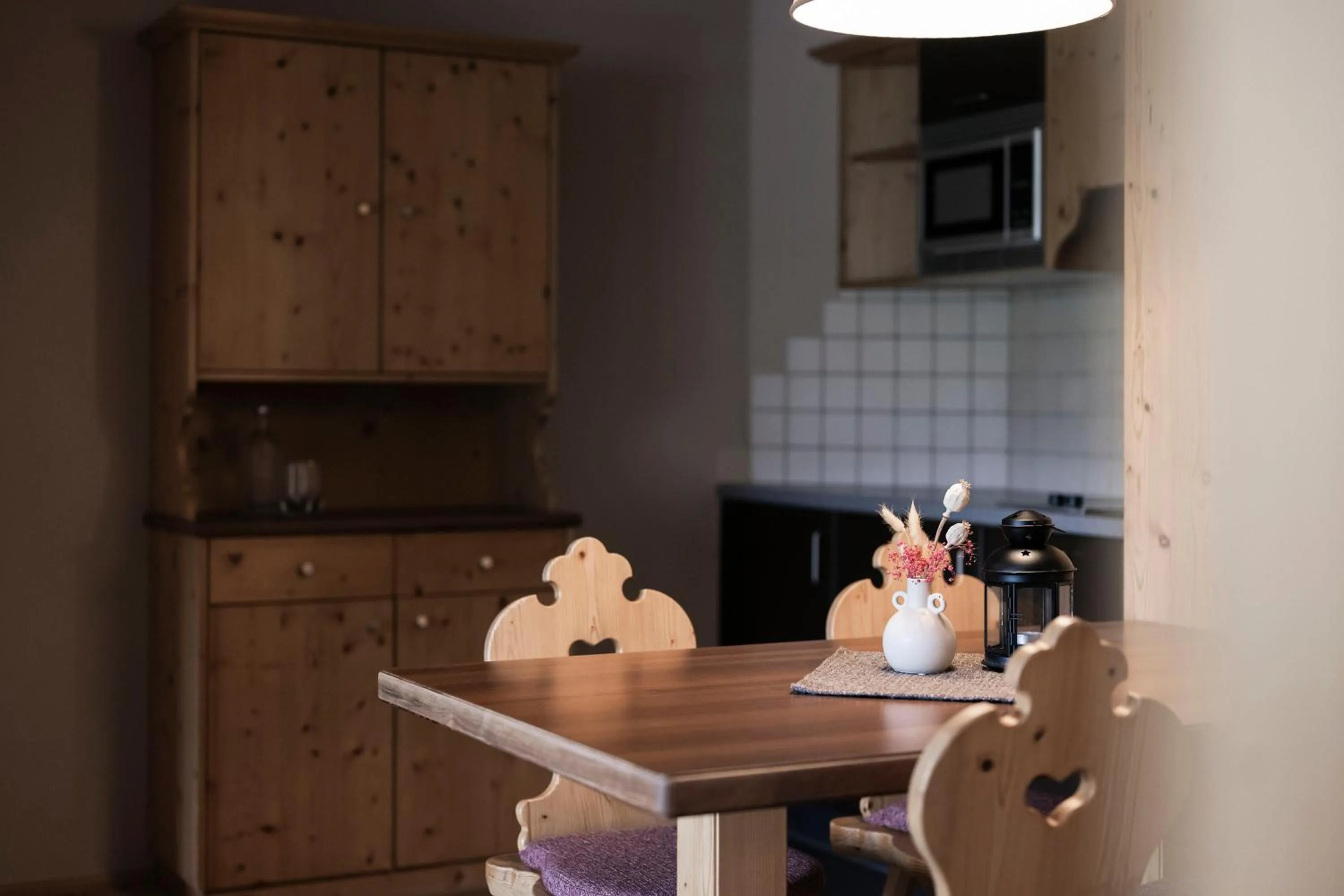 Dining area in Post Alpina - Family Mountain Chalets