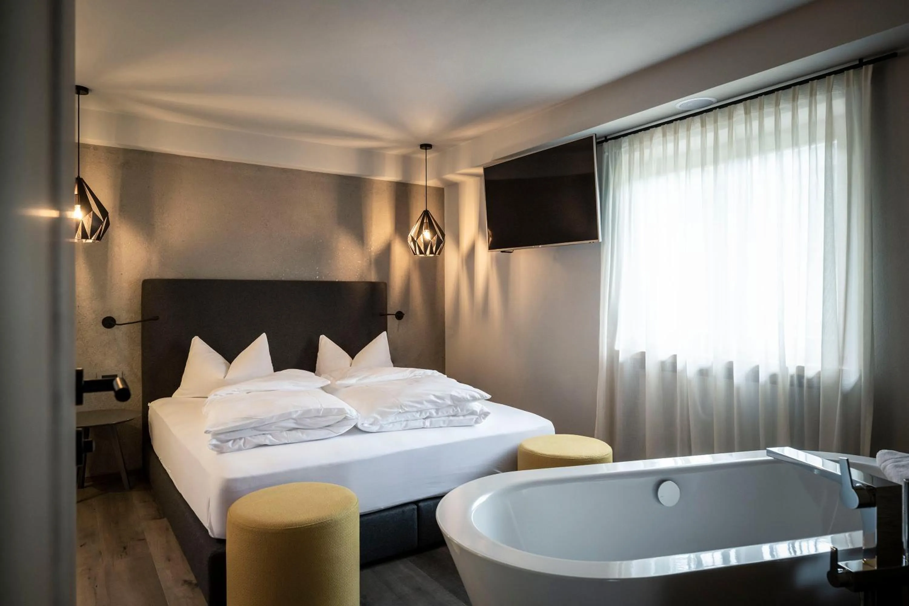 Photo of the whole room, Bed in Post Alpina - Family Mountain Chalets