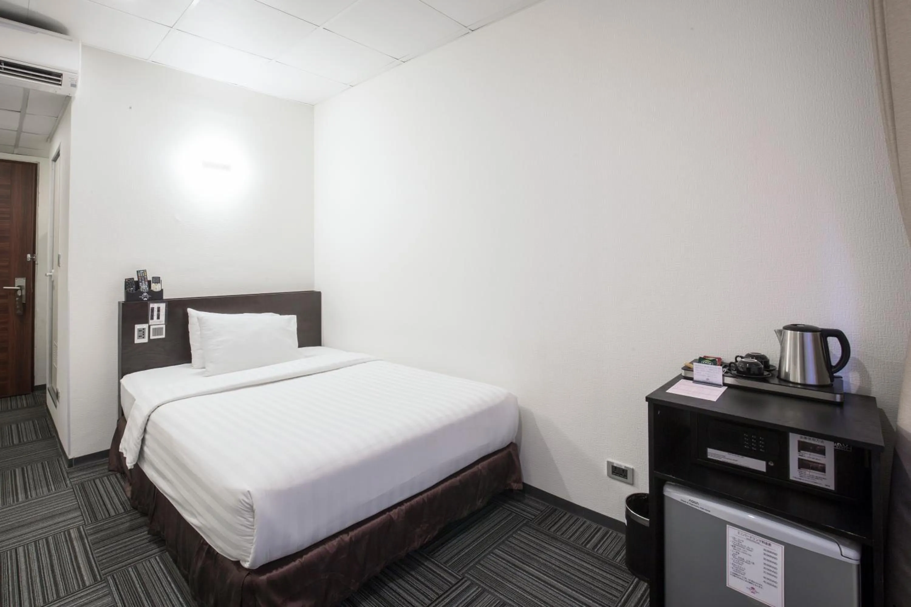 Bed in Sakura Hotel 3