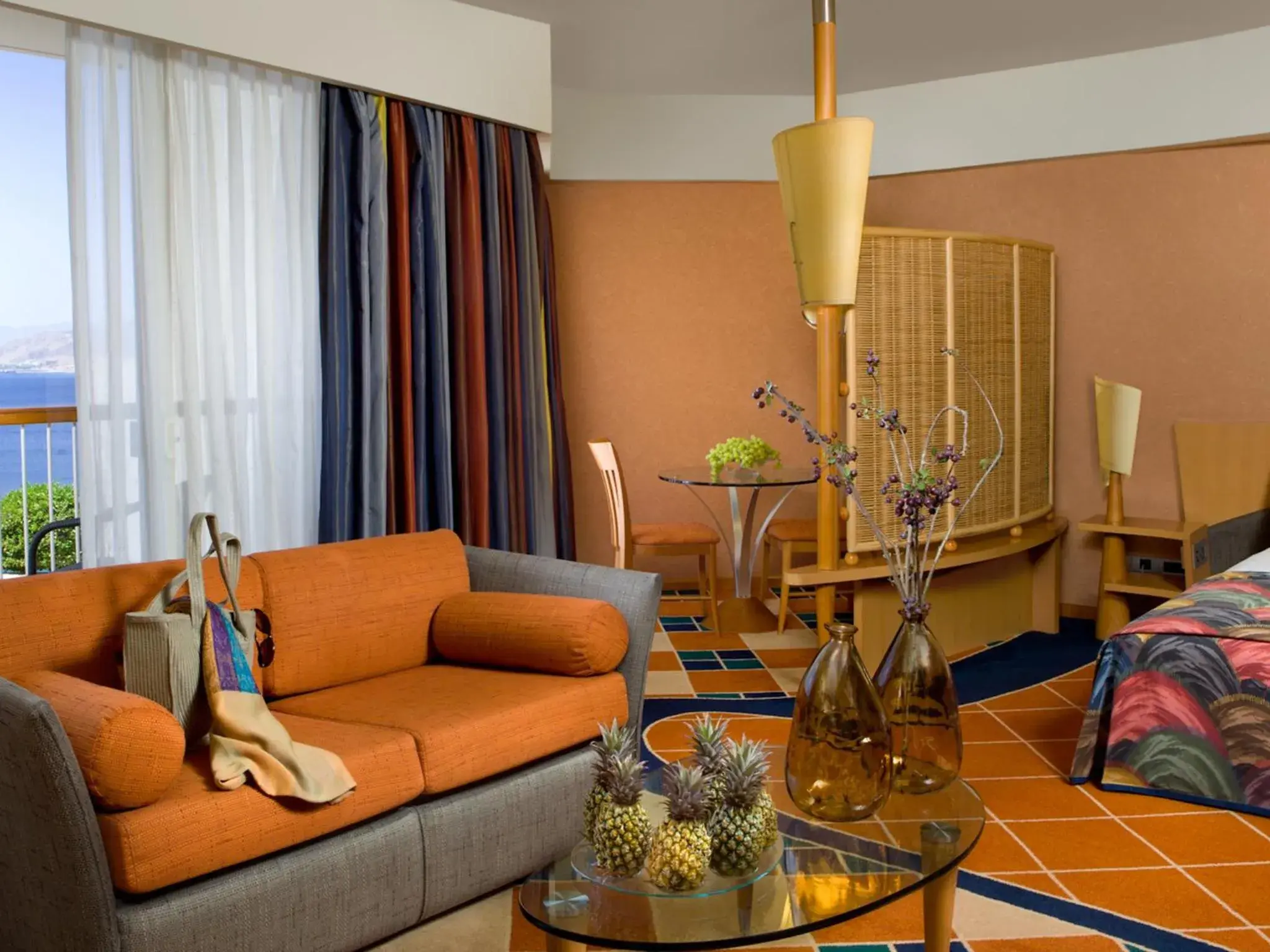 Seating area, Bed in Dan Eilat Hotel Seating area, Bed in Dan Eilat Hotel