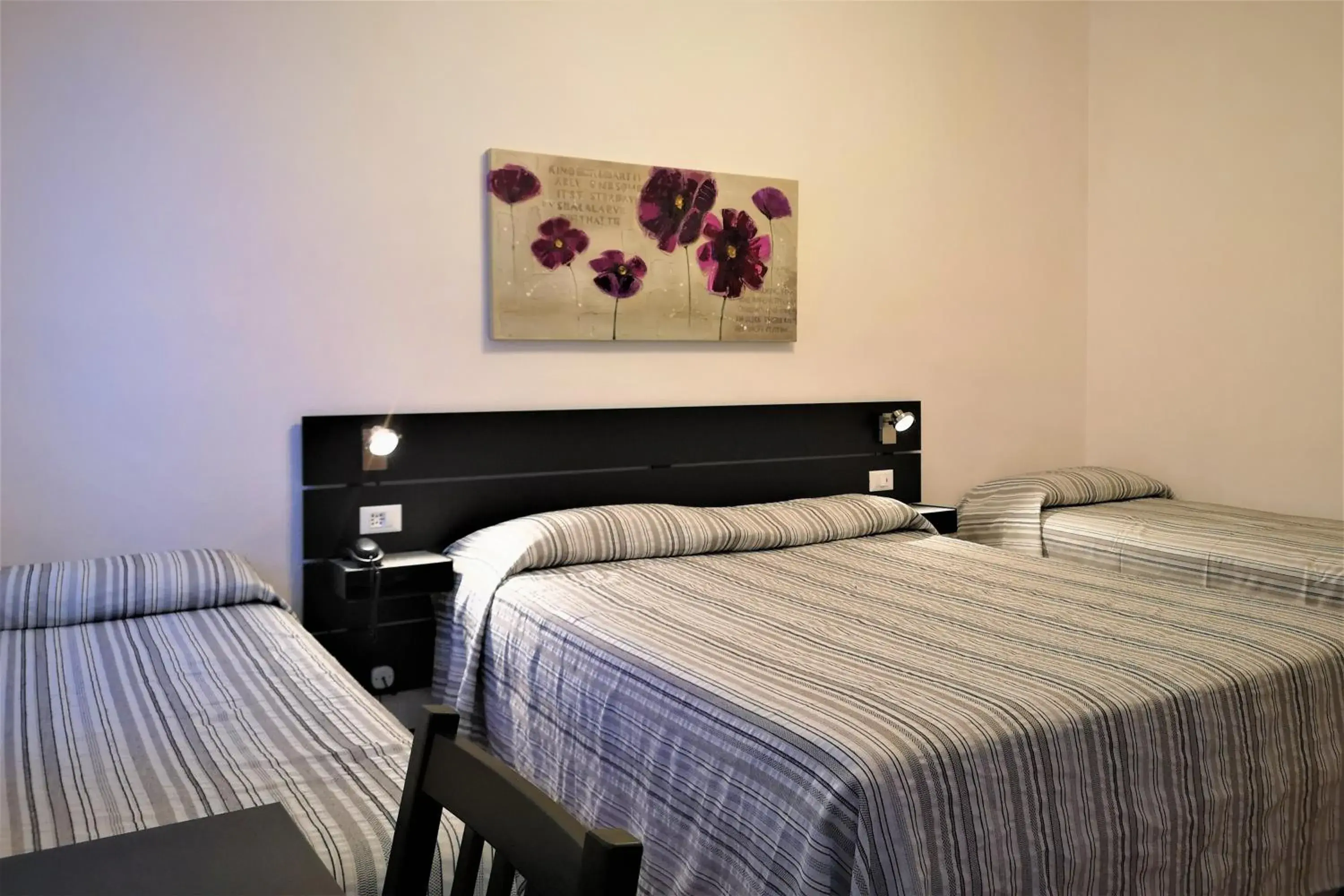 Quadruple Room in Hotel Rossi Quadruple Room in Hotel Rossi