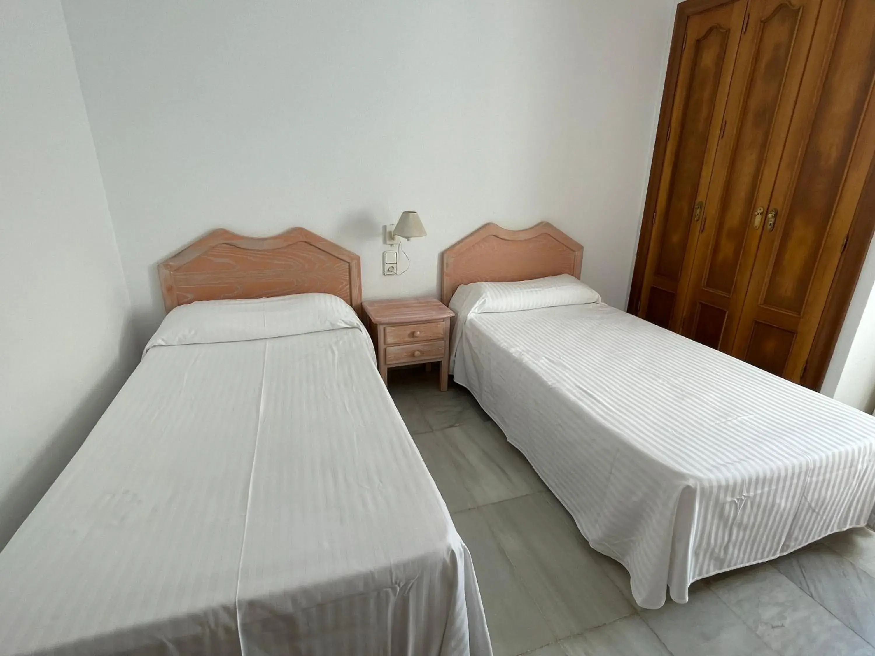 Bedroom, Bed in Apartamentos Golf Center Bedroom, Bed in Apartamentos Golf Center