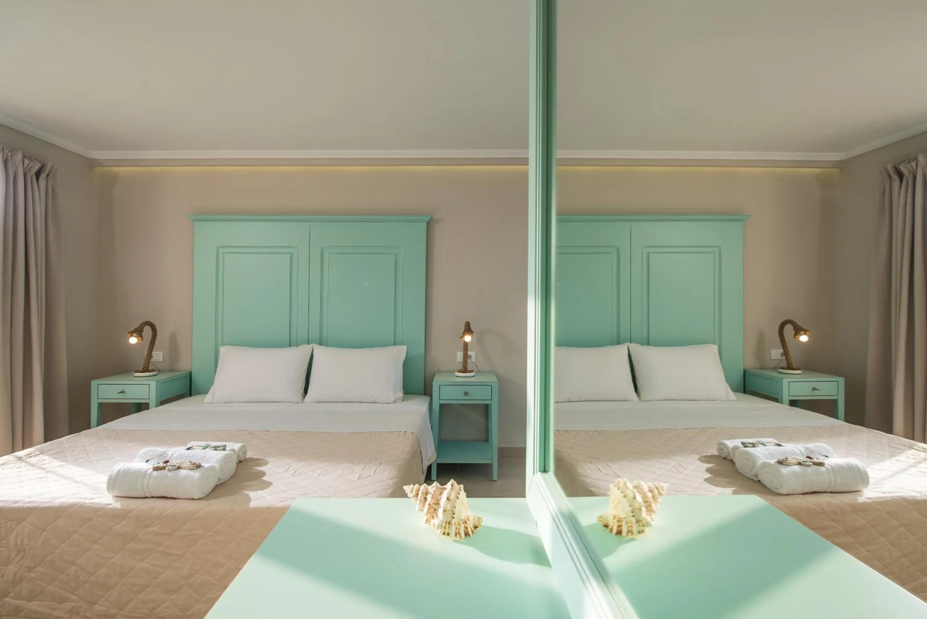 Bed in Notos Heights Hotel & Suites