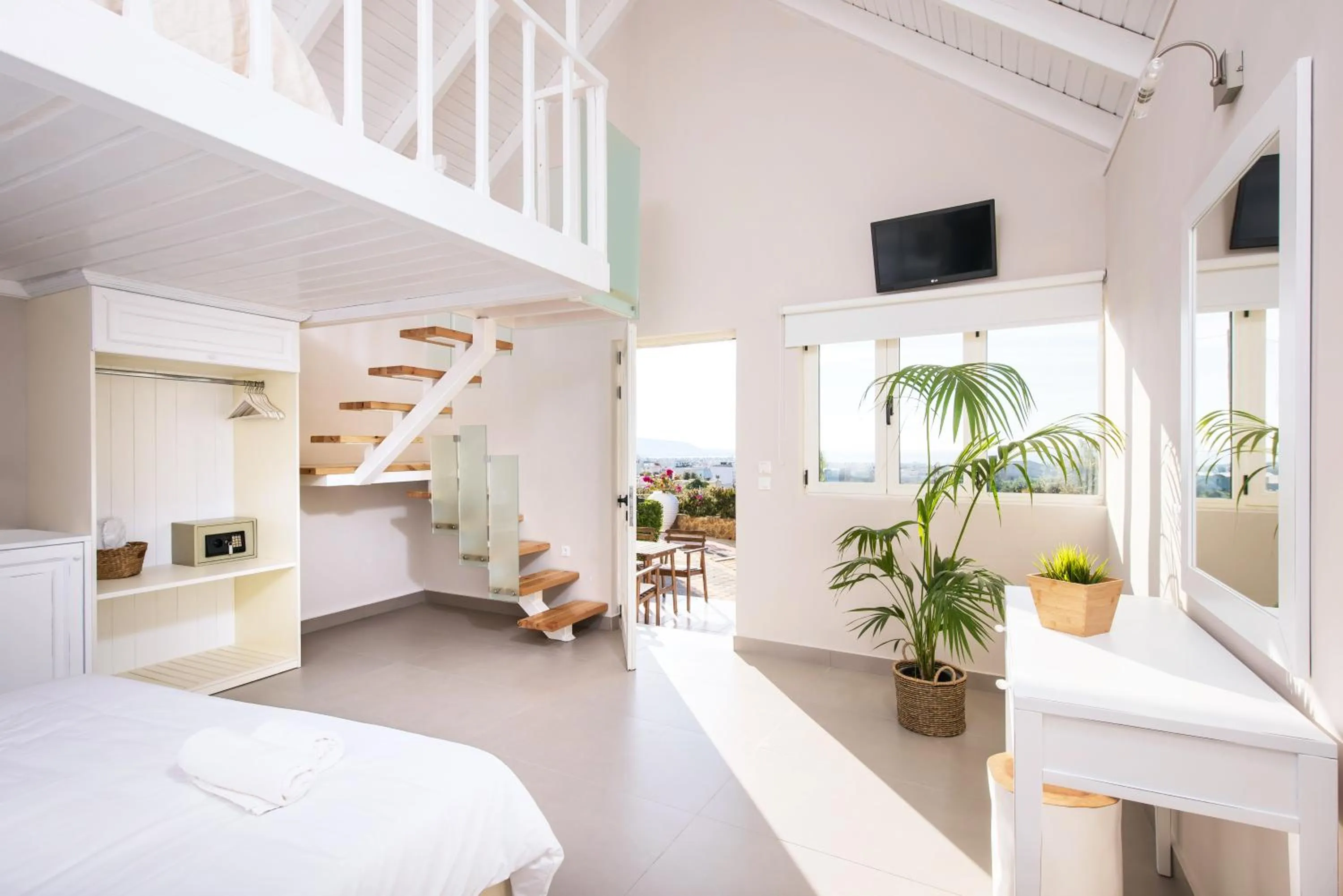 Bed in Notos Heights Hotel & Suites