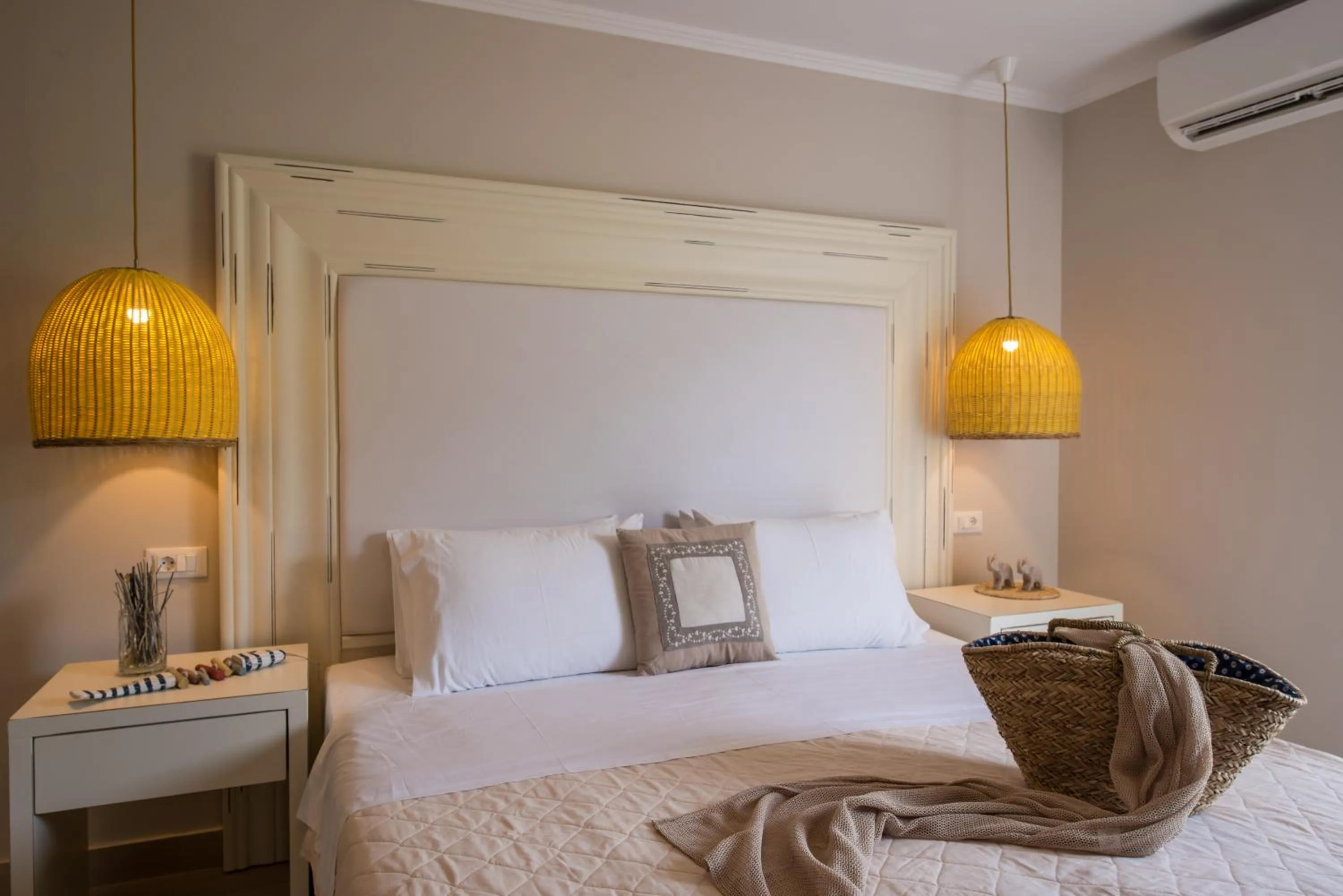 Bed in Notos Heights Hotel & Suites