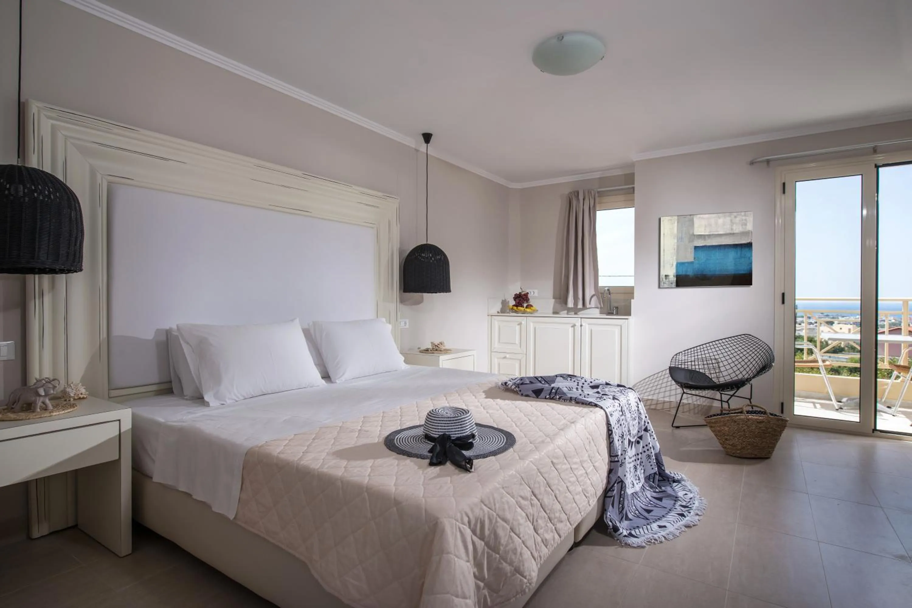 Bed in Notos Heights Hotel & Suites