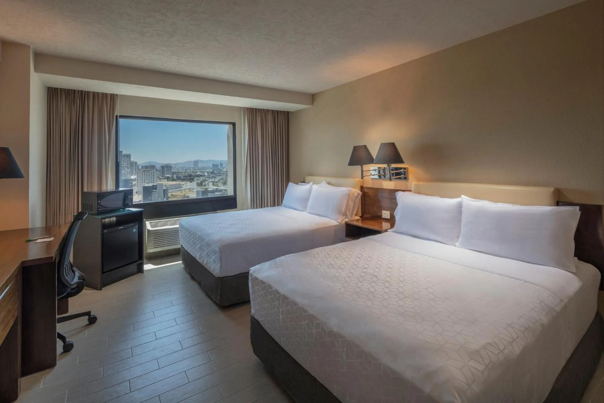 Photo of the whole room, Bed in Holiday Inn Puebla La Noria by IHG
