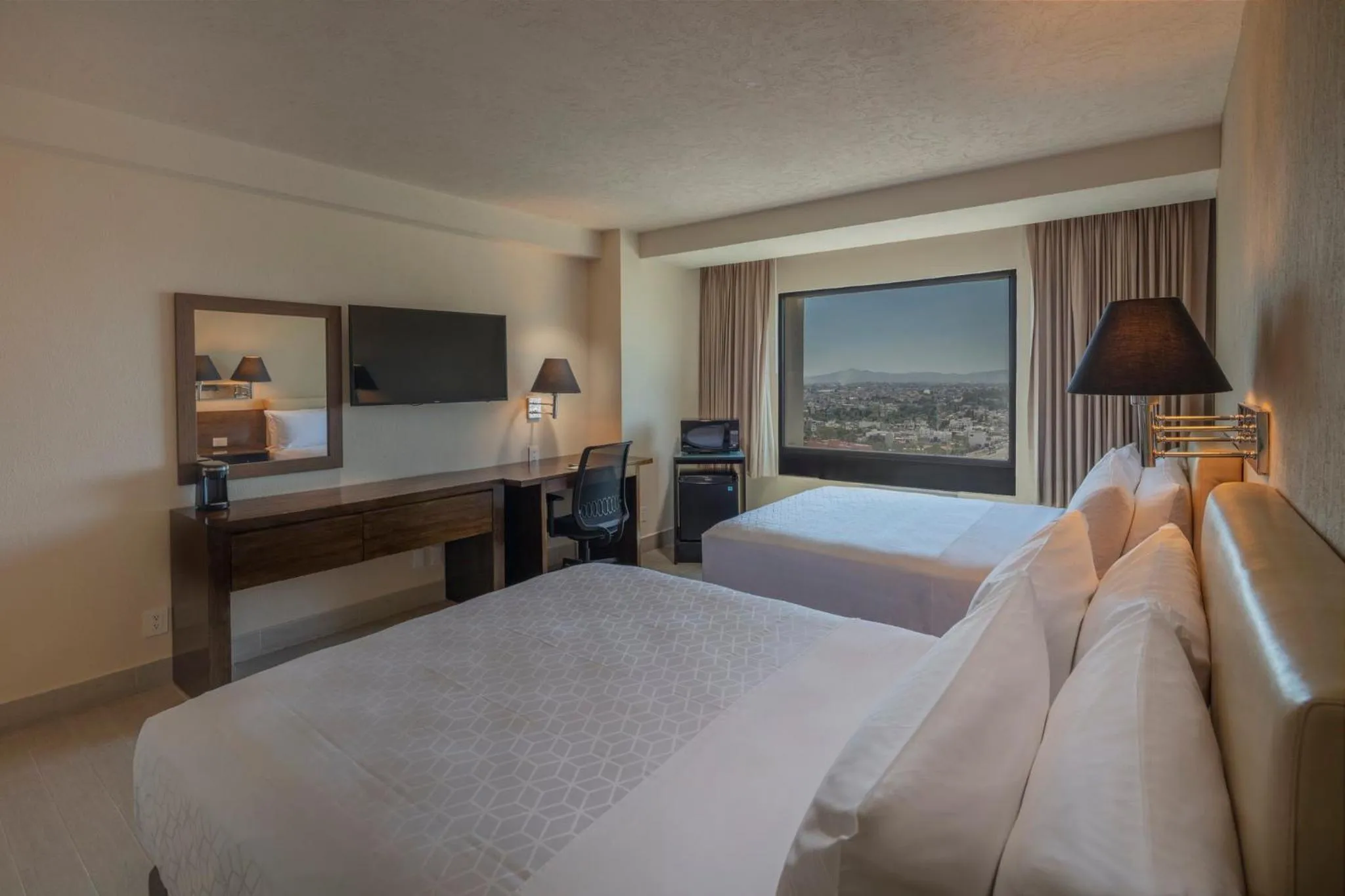 Photo of the whole room, Bed in Holiday Inn Puebla La Noria by IHG