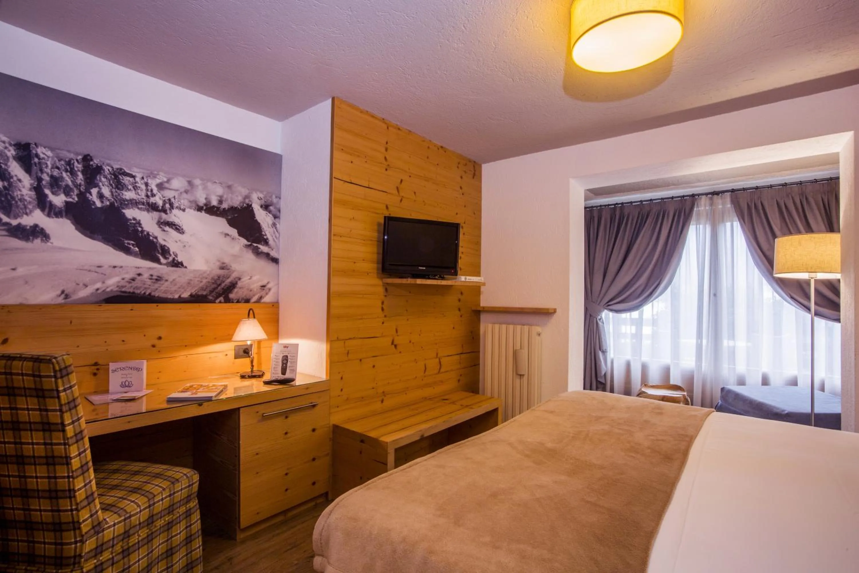 Photo of the whole room, Bed in Hotel Pilier D'Angle & Wellness