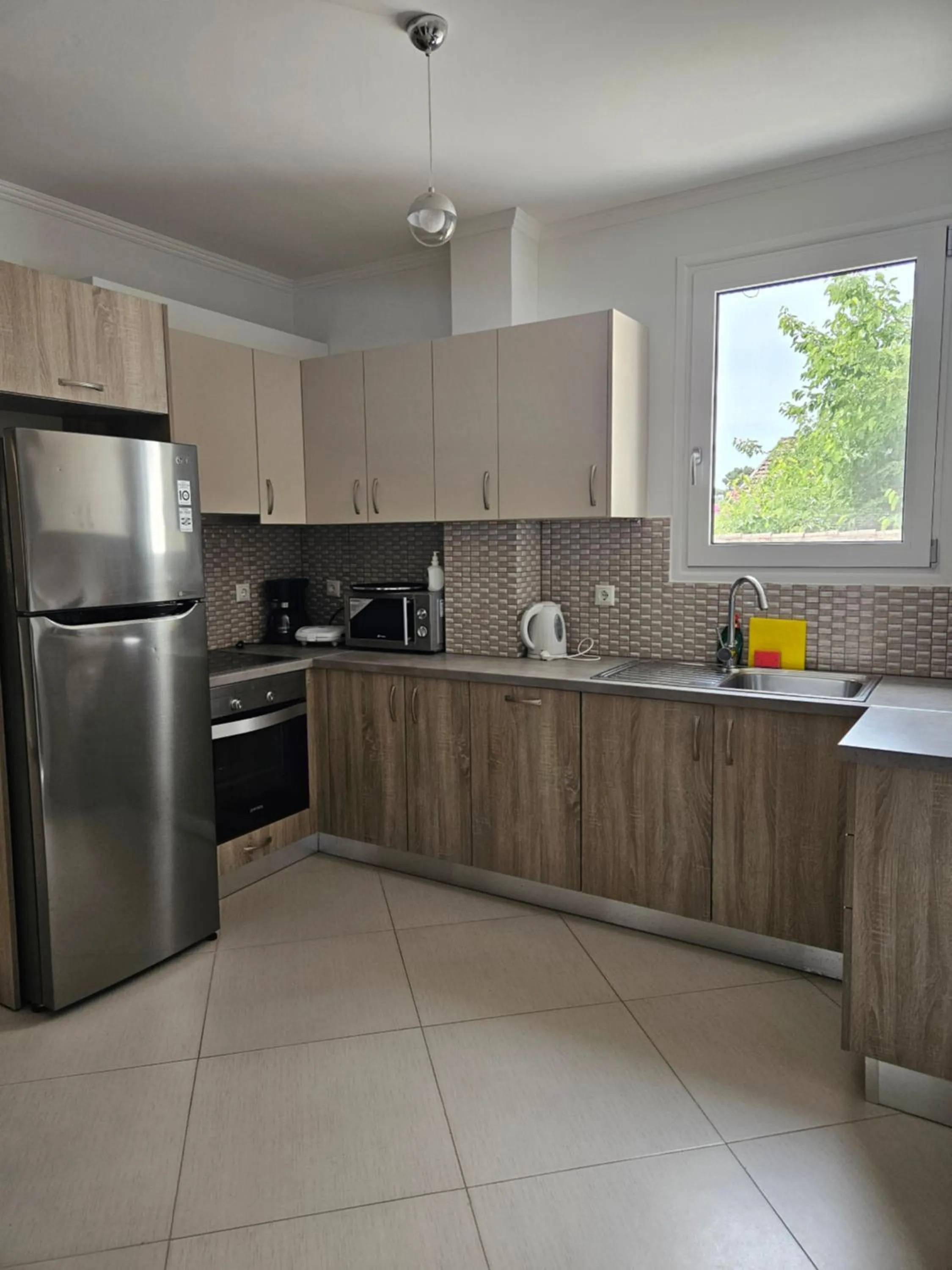 Kitchen or kitchenette in Diwani Luxury Villas