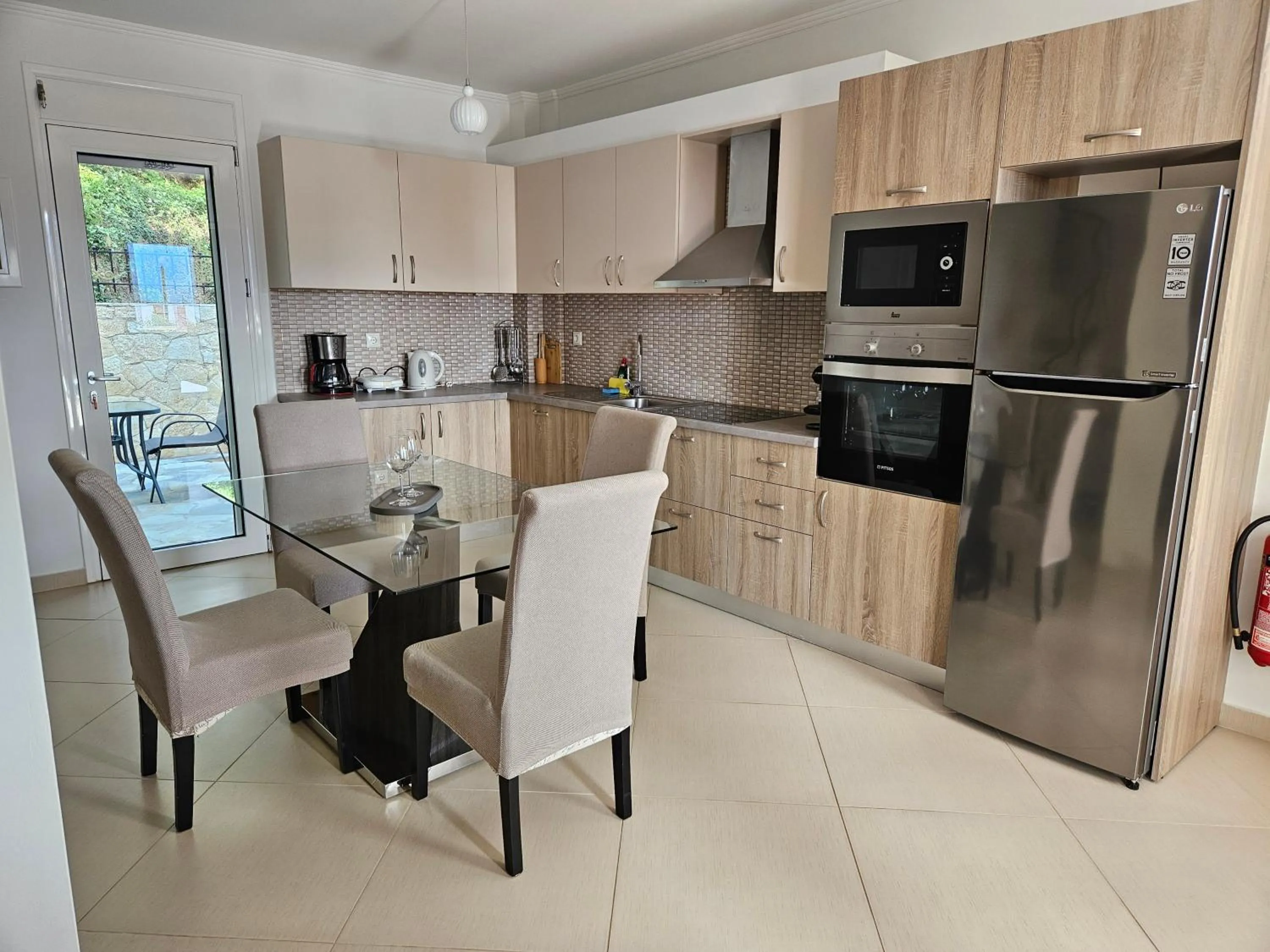 Kitchen or kitchenette in Diwani Luxury Villas