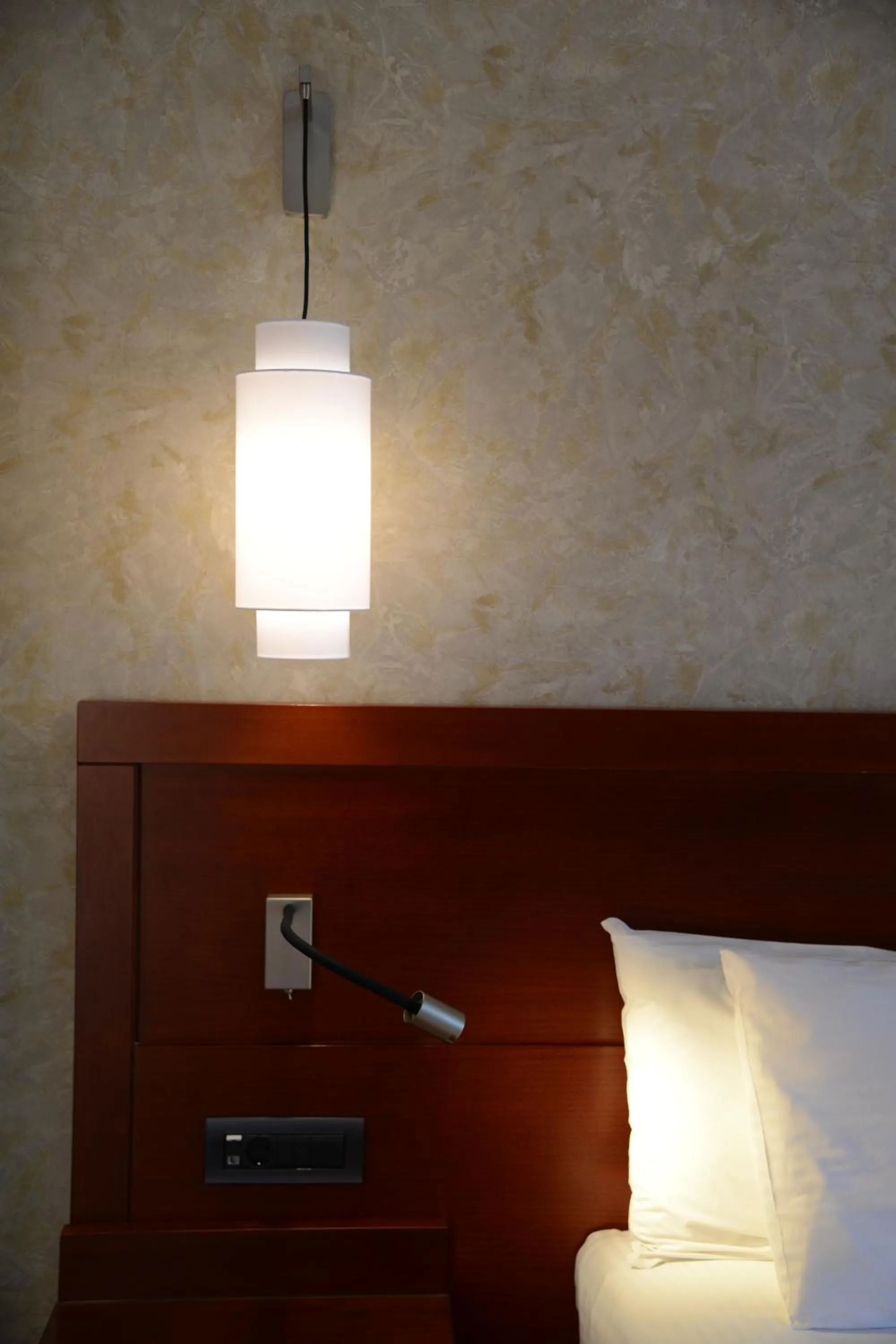 Bed in Viaros Hotel Apartments