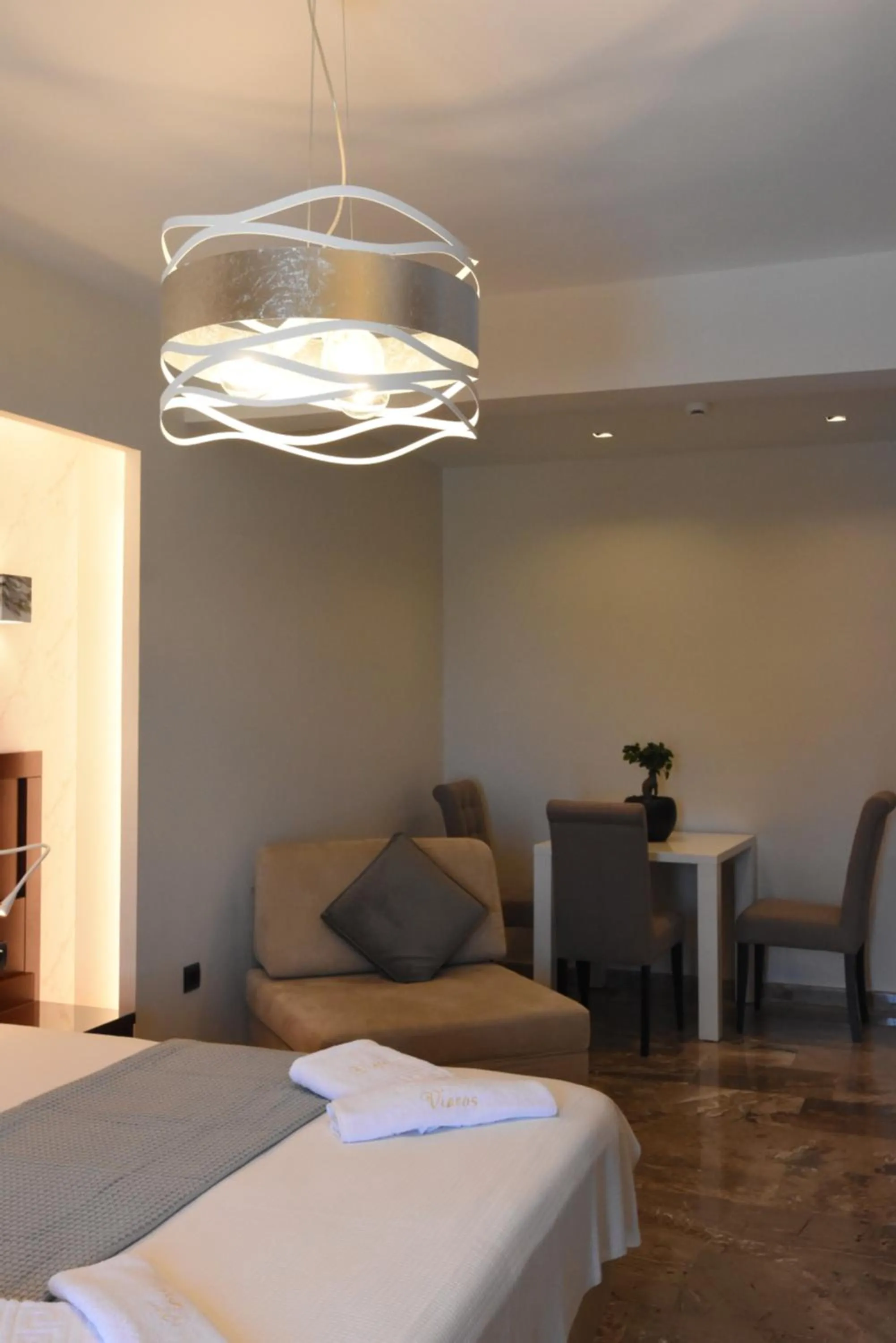 Bed in Viaros Hotel Apartments