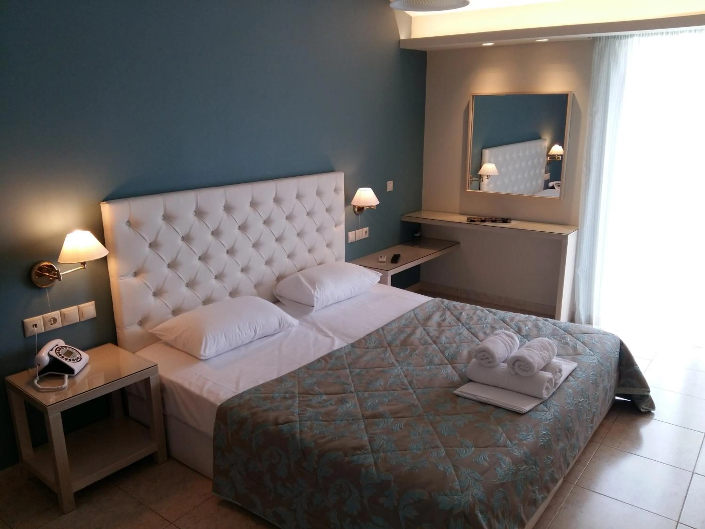 Bed in Viaros Hotel Apartments