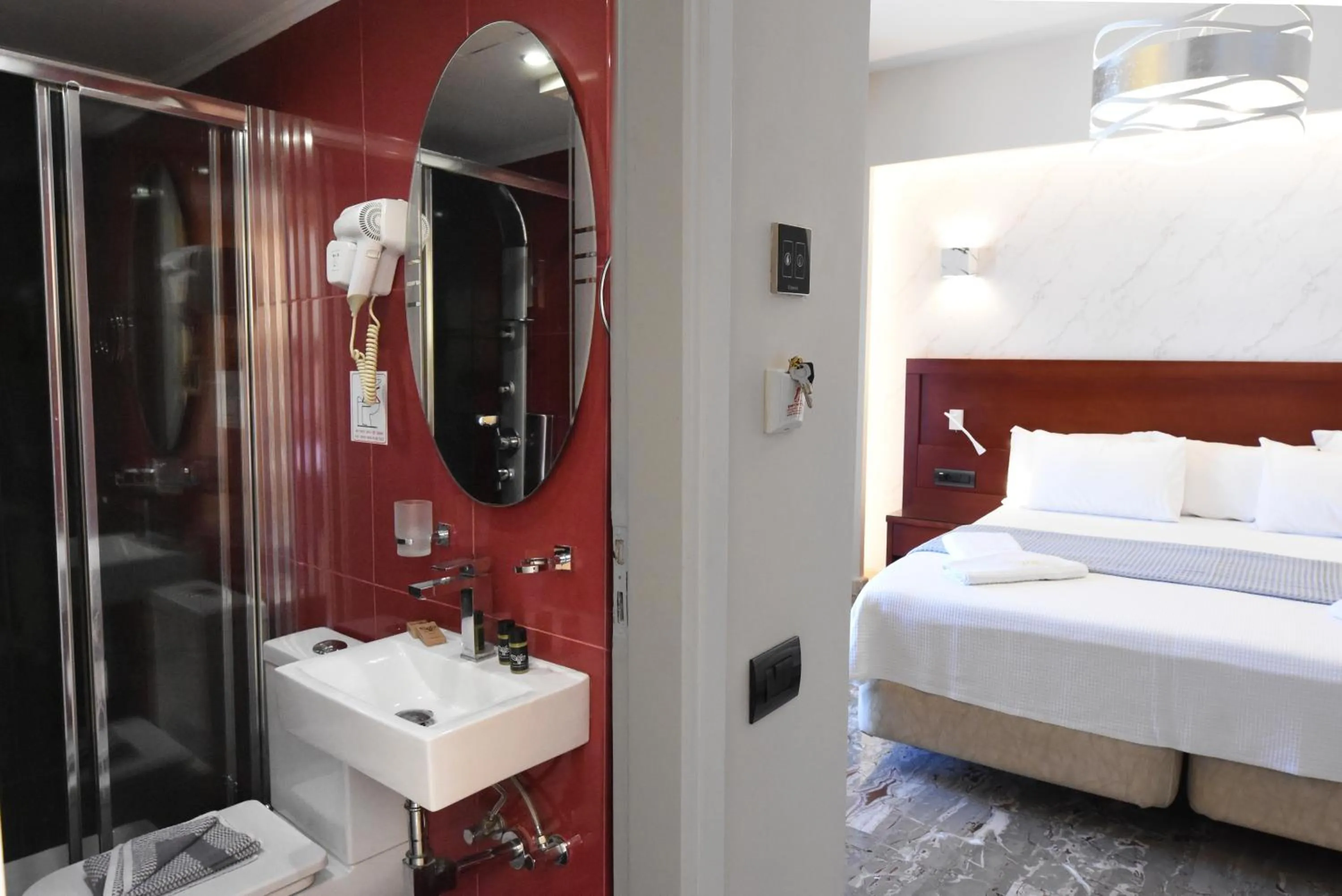 Bathroom, Bed in Viaros Hotel Apartments