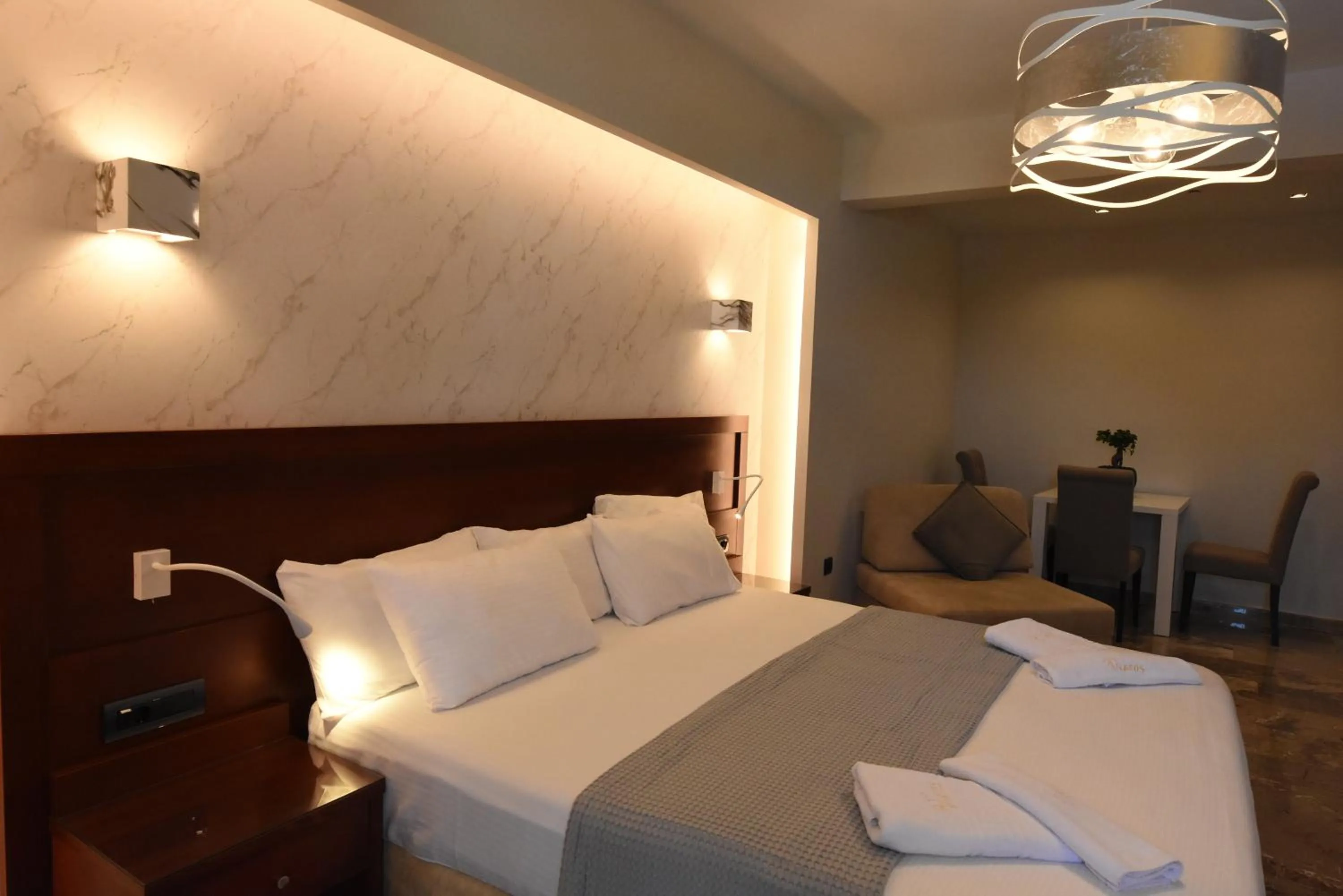 Bed in Viaros Hotel Apartments