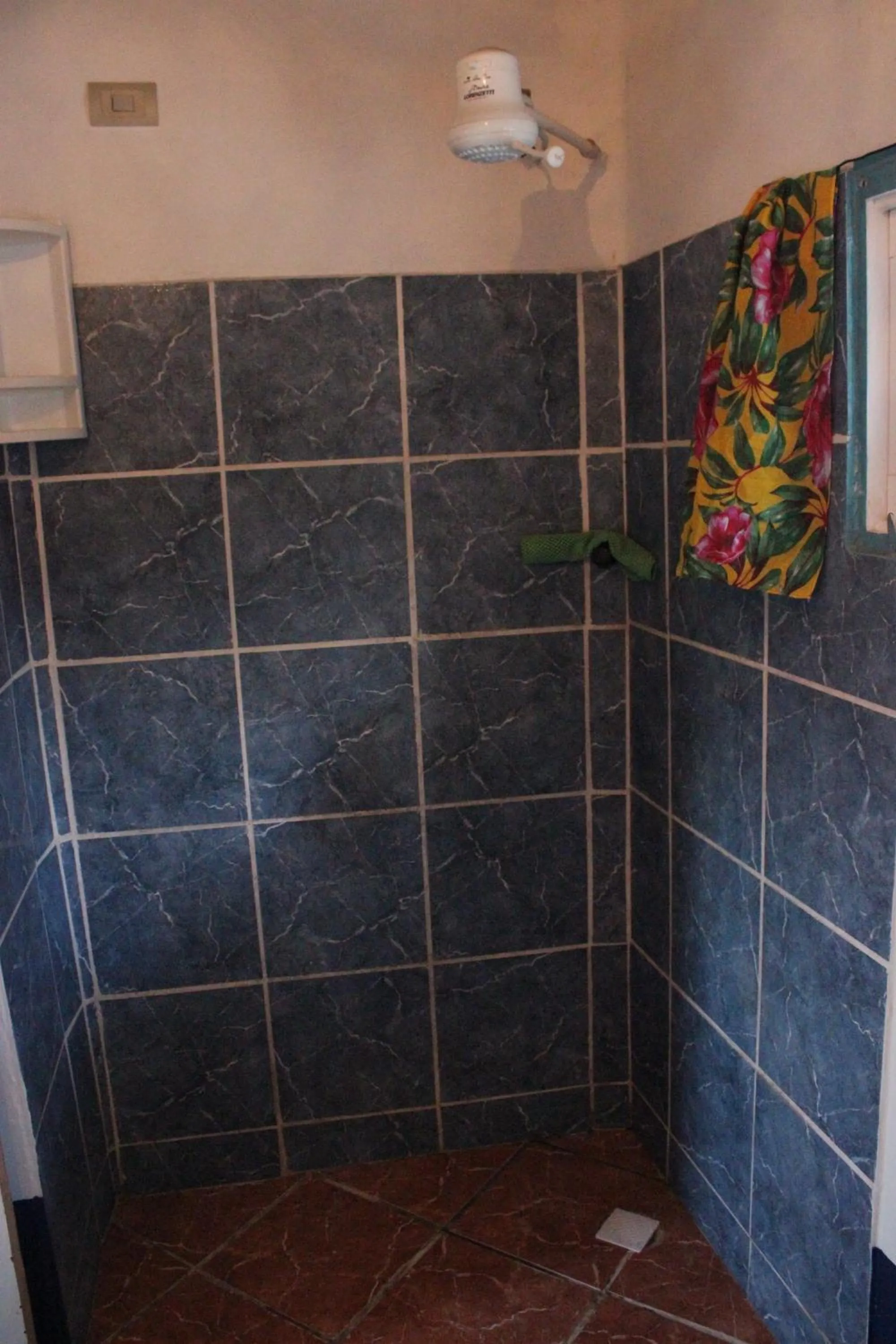 Shower in Lagoa dos Coqueiros