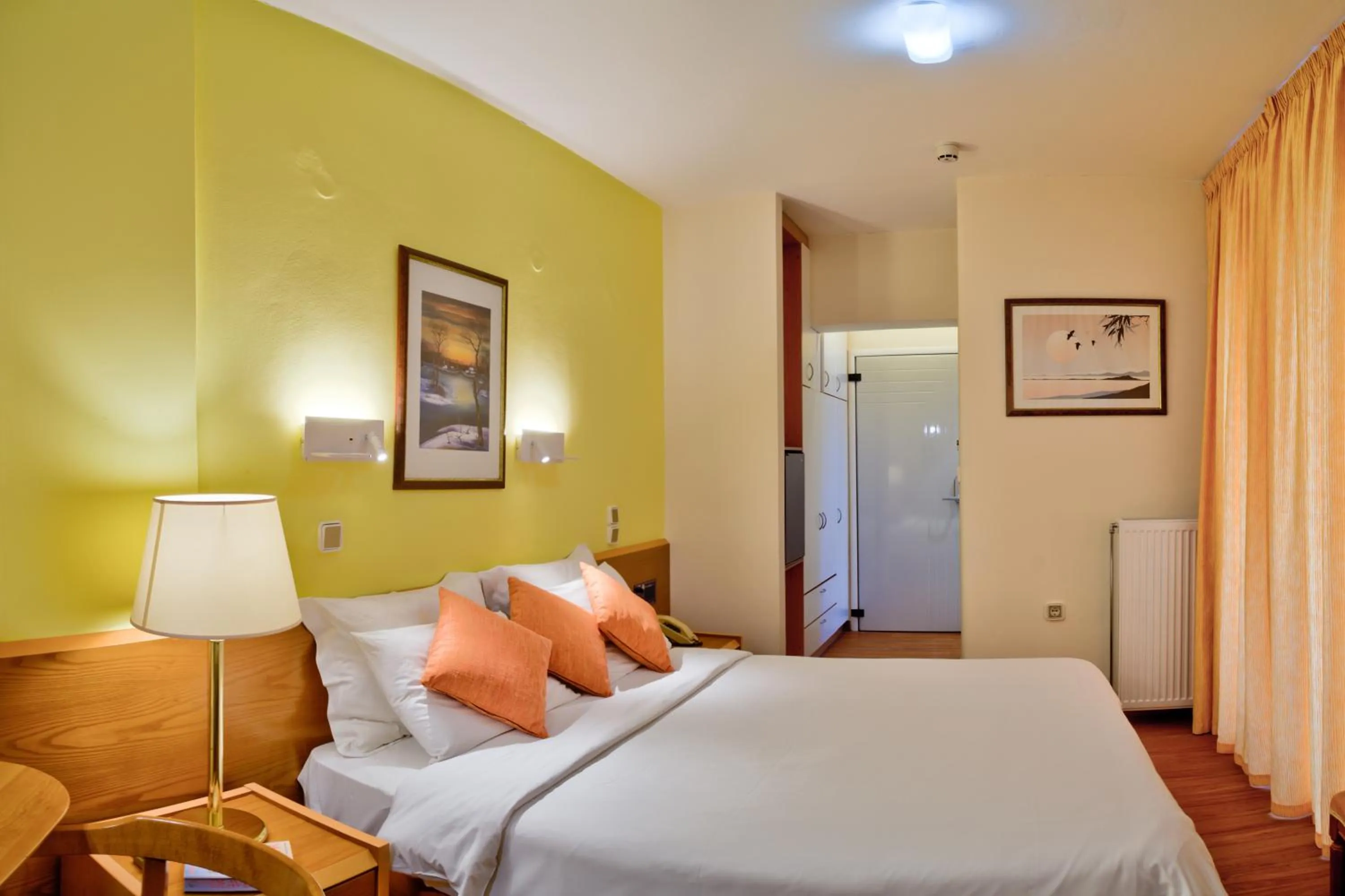 Bed in Poseidon Hotel