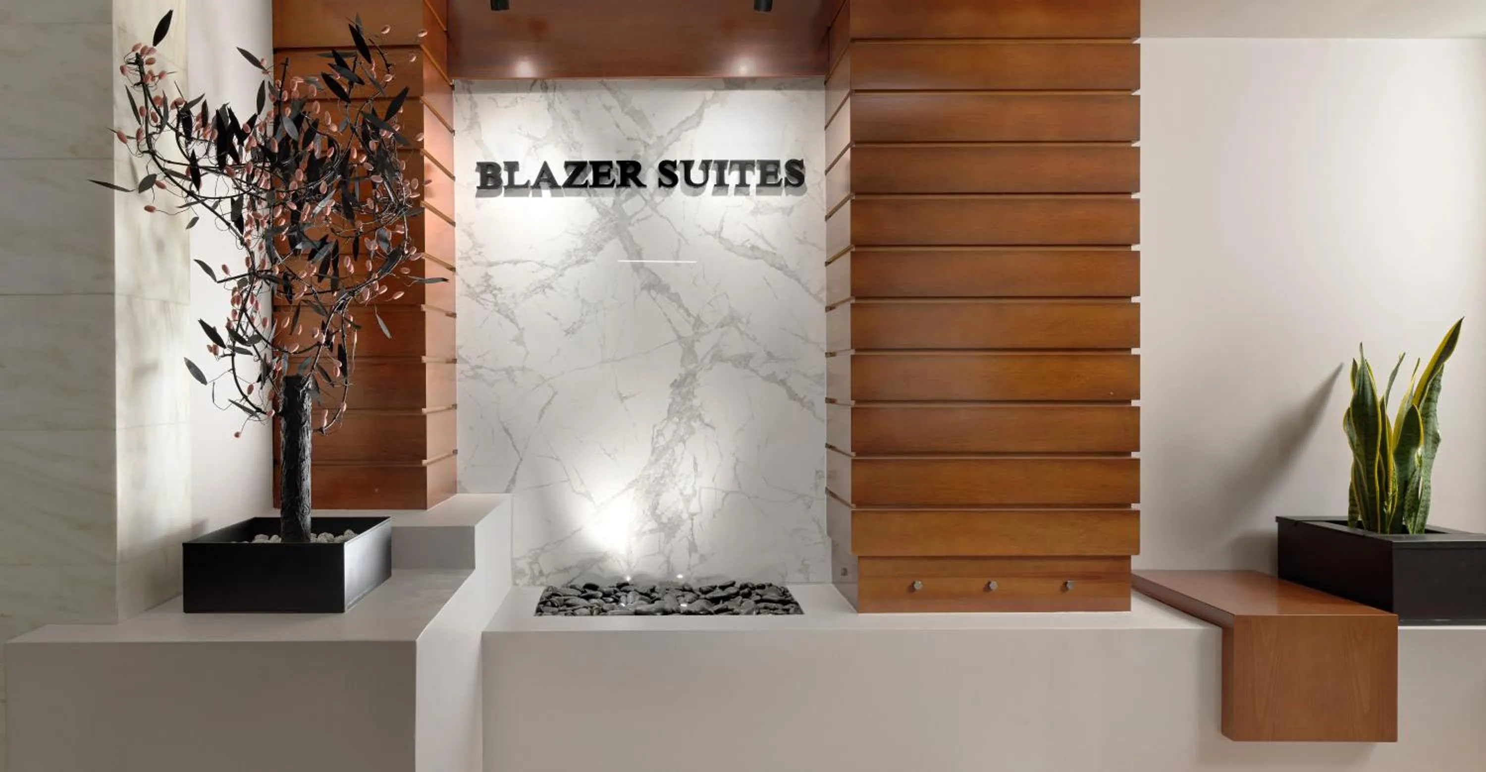Lobby or reception in Blazer Suites Hotel