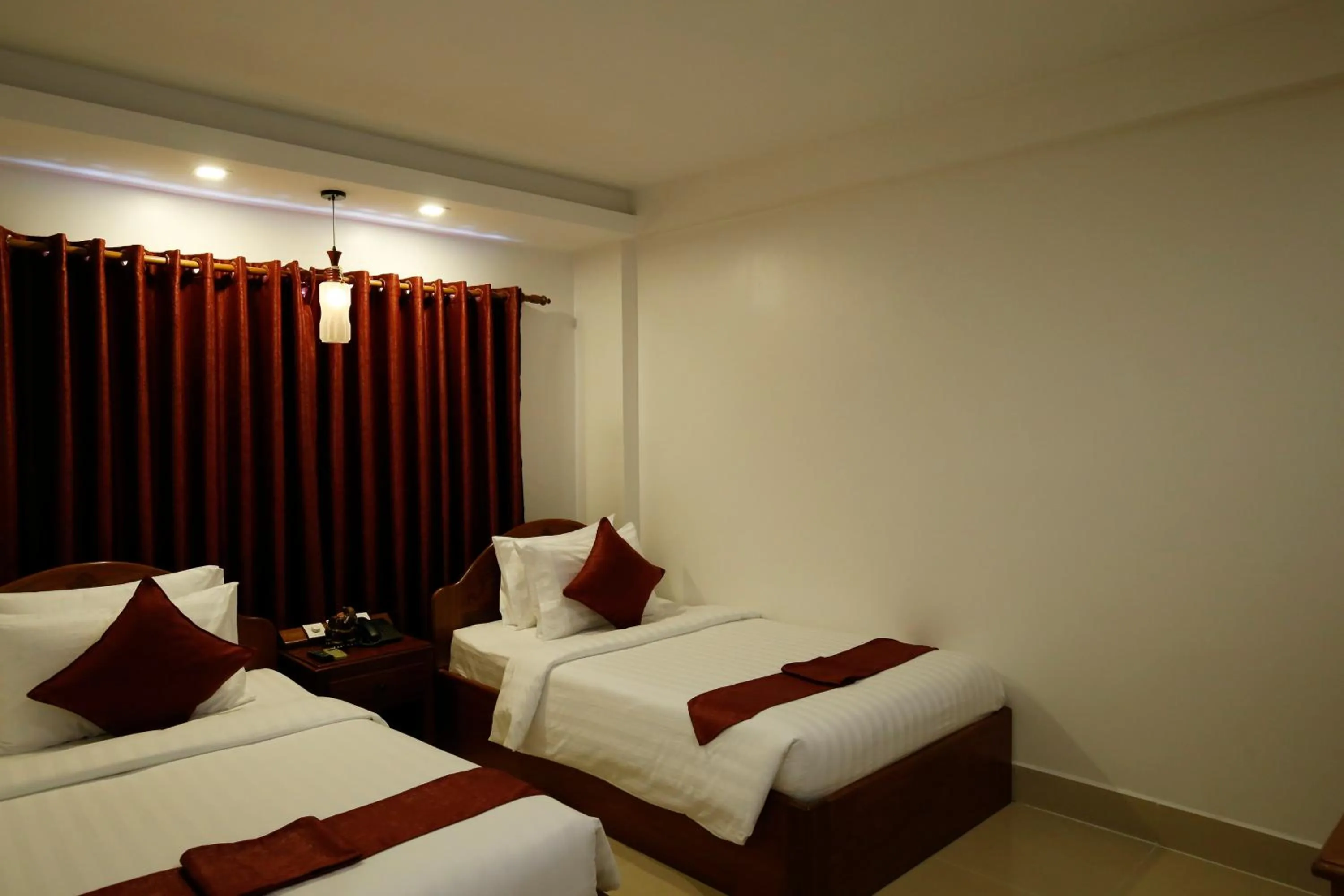 Bed in Holy Angkor Hotel