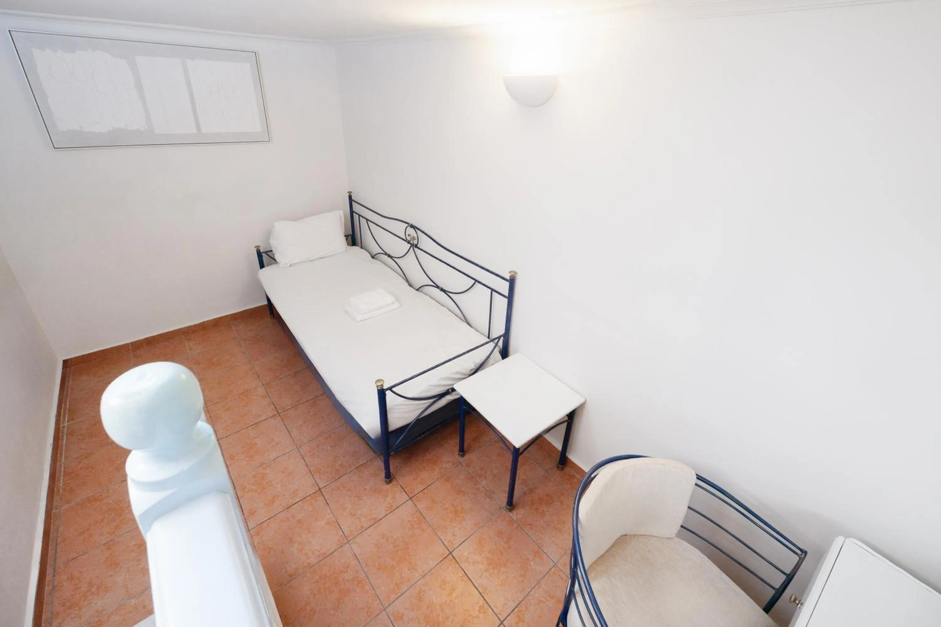 Bed in Kastro Suites