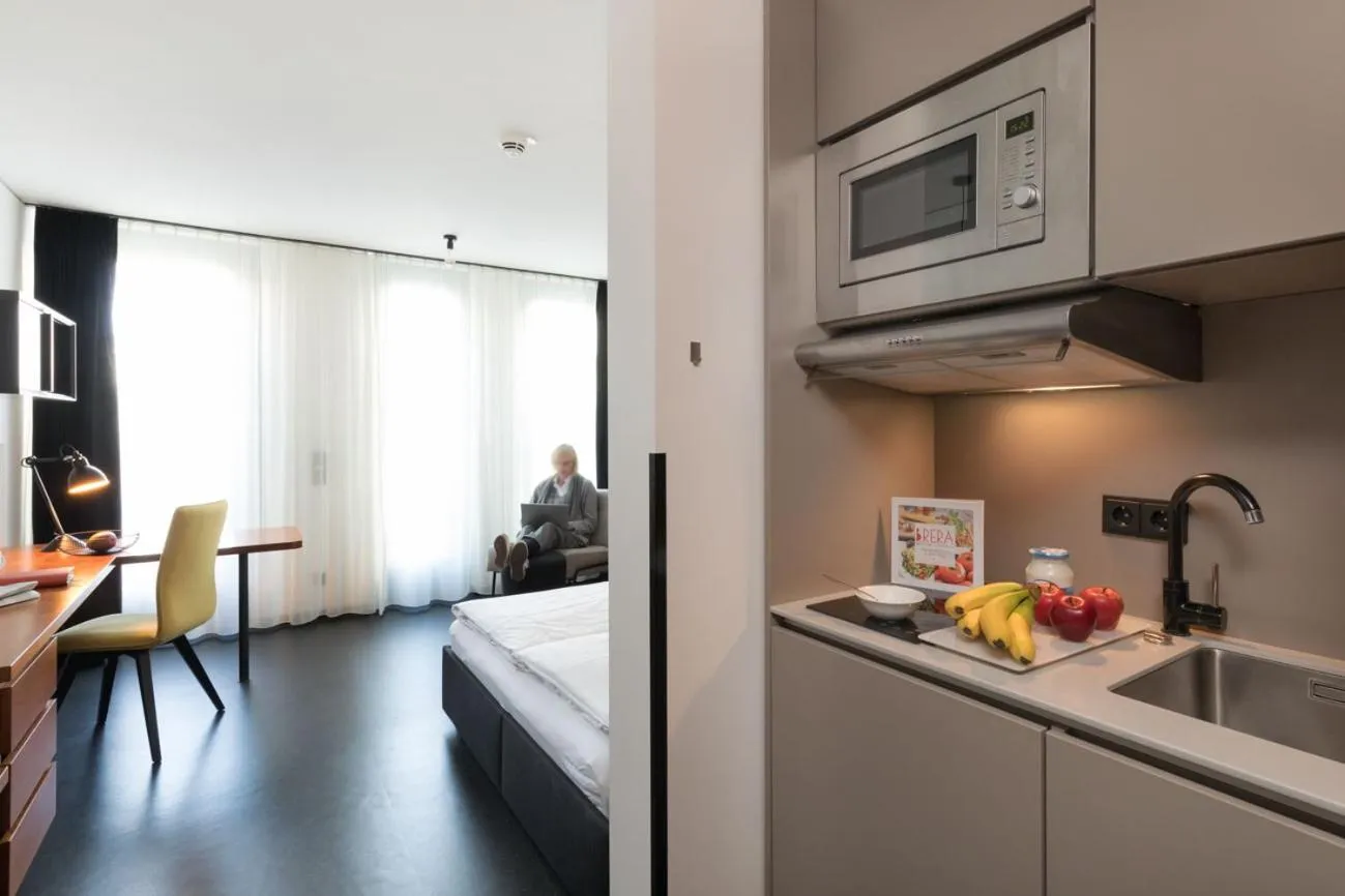 Kitchen or kitchenette in Brera Serviced Apartments Munich Schwabing