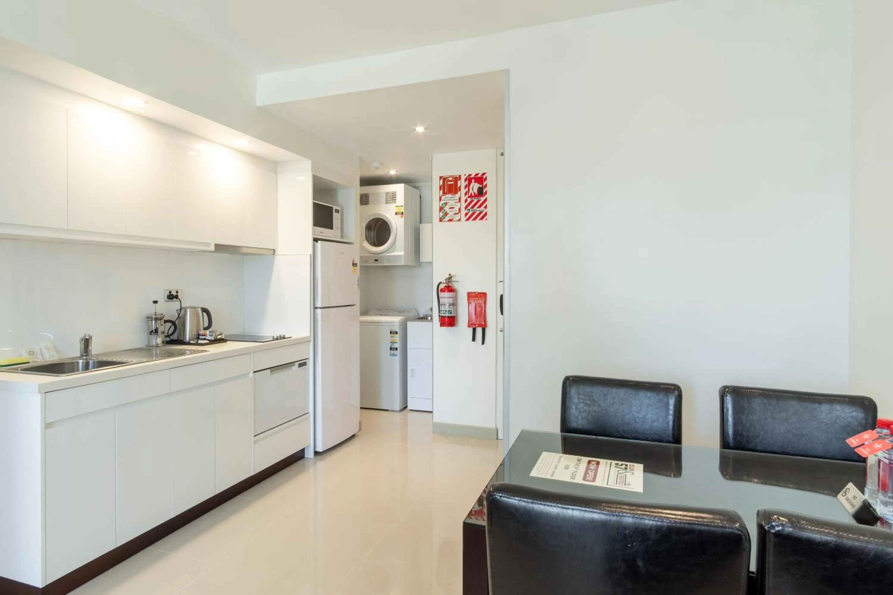 Kitchen or kitchenette in Ramada Suites by Wyndham Wailoaloa Beach Fiji