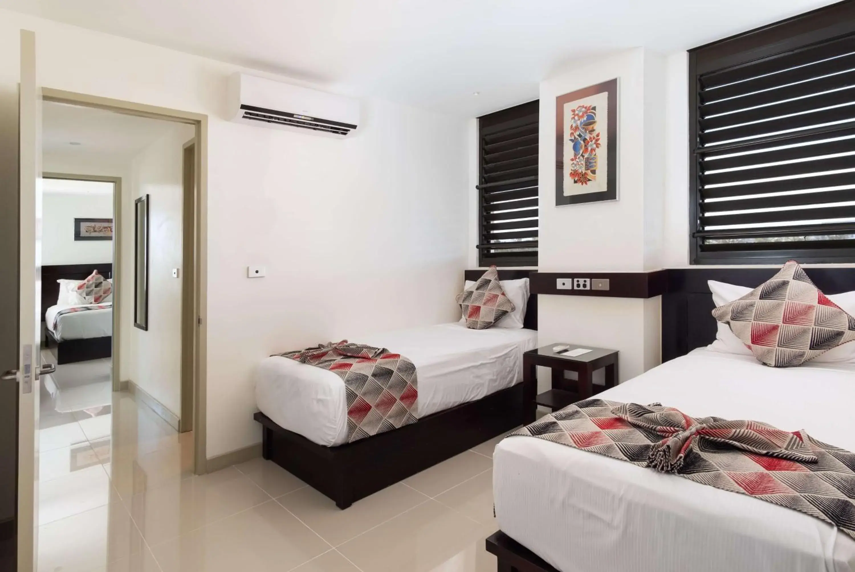 Photo of the whole room, Bed in Ramada Suites by Wyndham Wailoaloa Beach Fiji Photo of the whole room, Bed in Ramada Suites by Wyndham Wailoaloa Beach Fiji