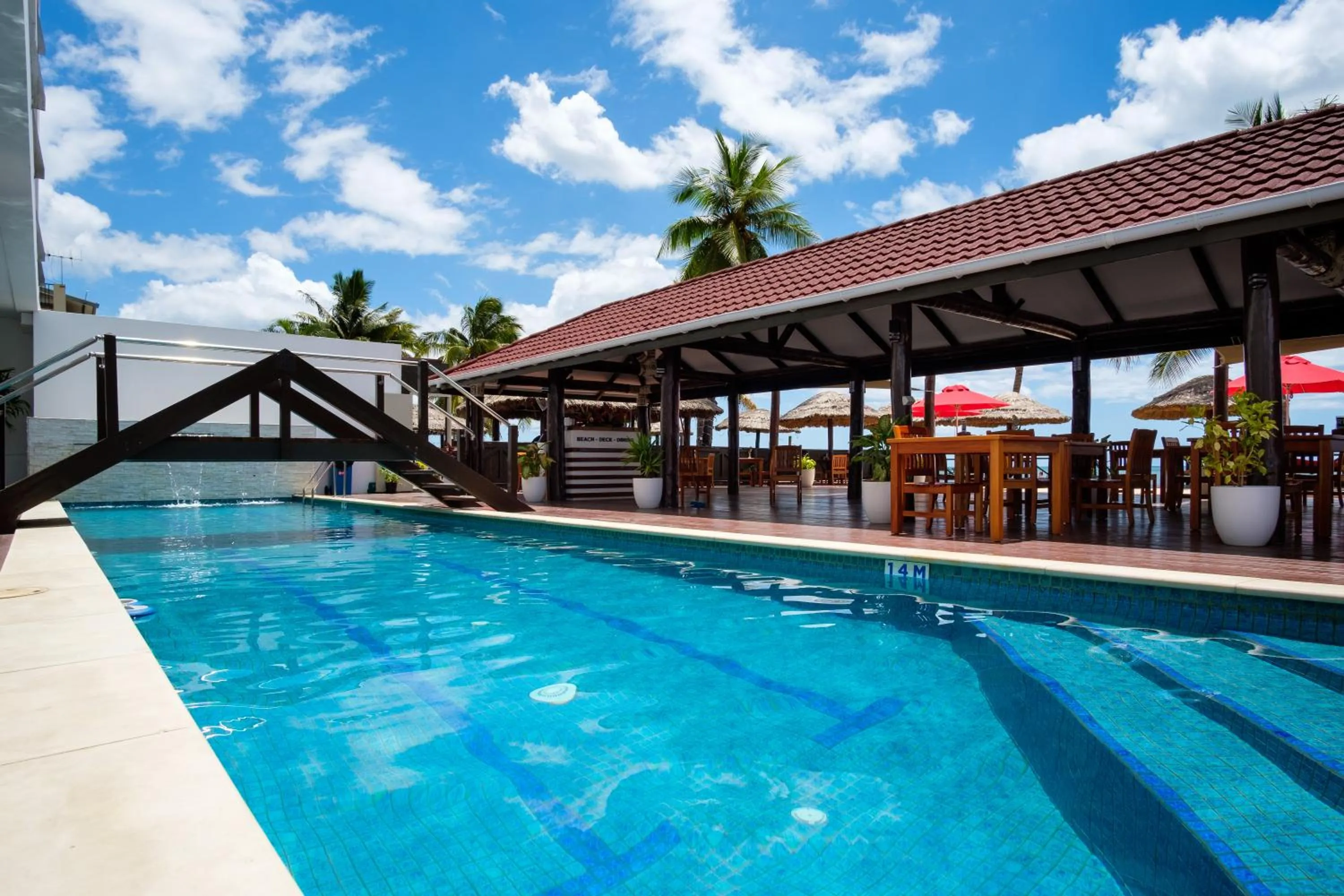 Swimming pool in Ramada Suites by Wyndham Wailoaloa Beach Fiji