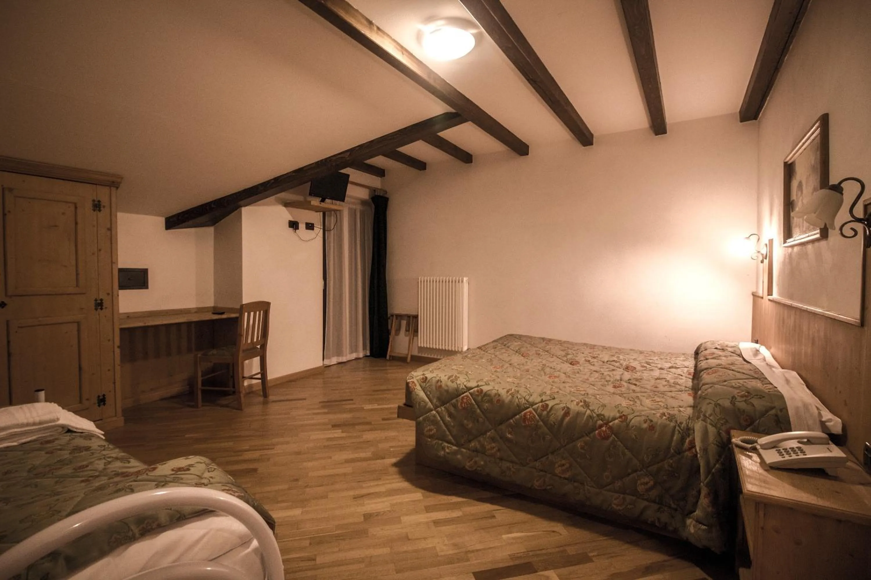 Bed in Garni Il Muretto