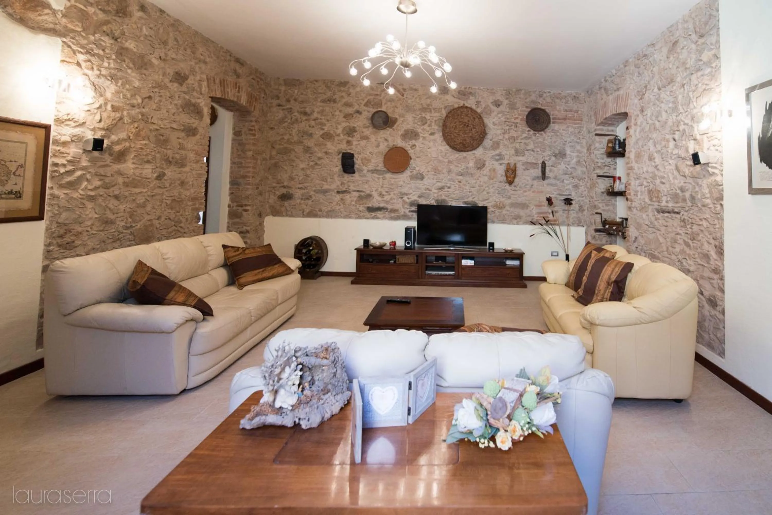 Communal lounge/ TV room in B&B Sa Costera