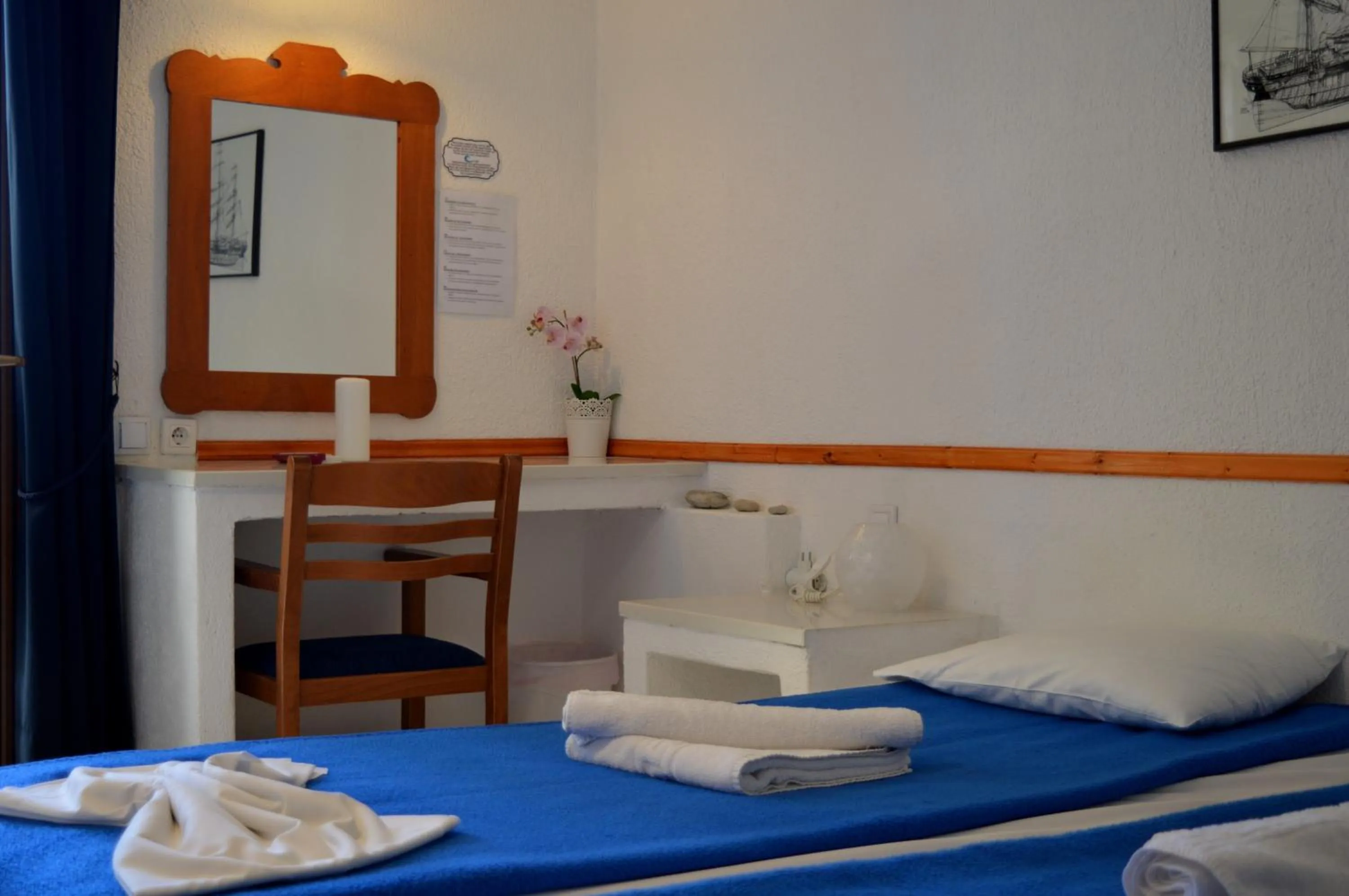 Bed in Mantraki Hotel Apartments