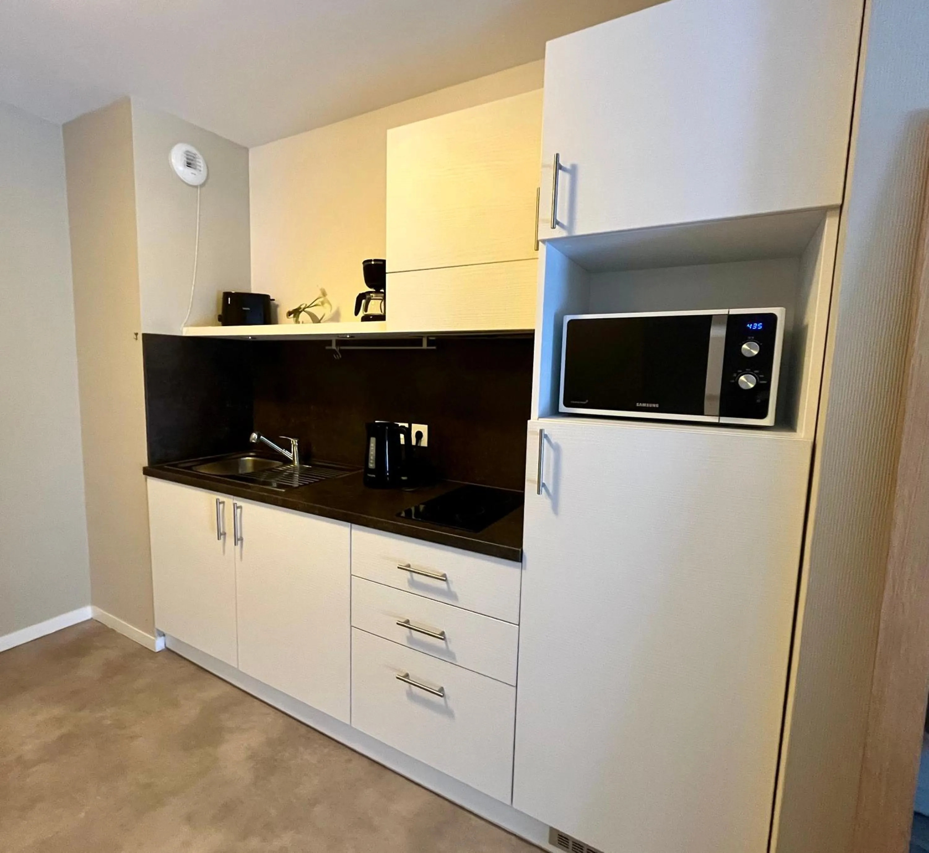 Kitchen or kitchenette in Domitys Le Millésime