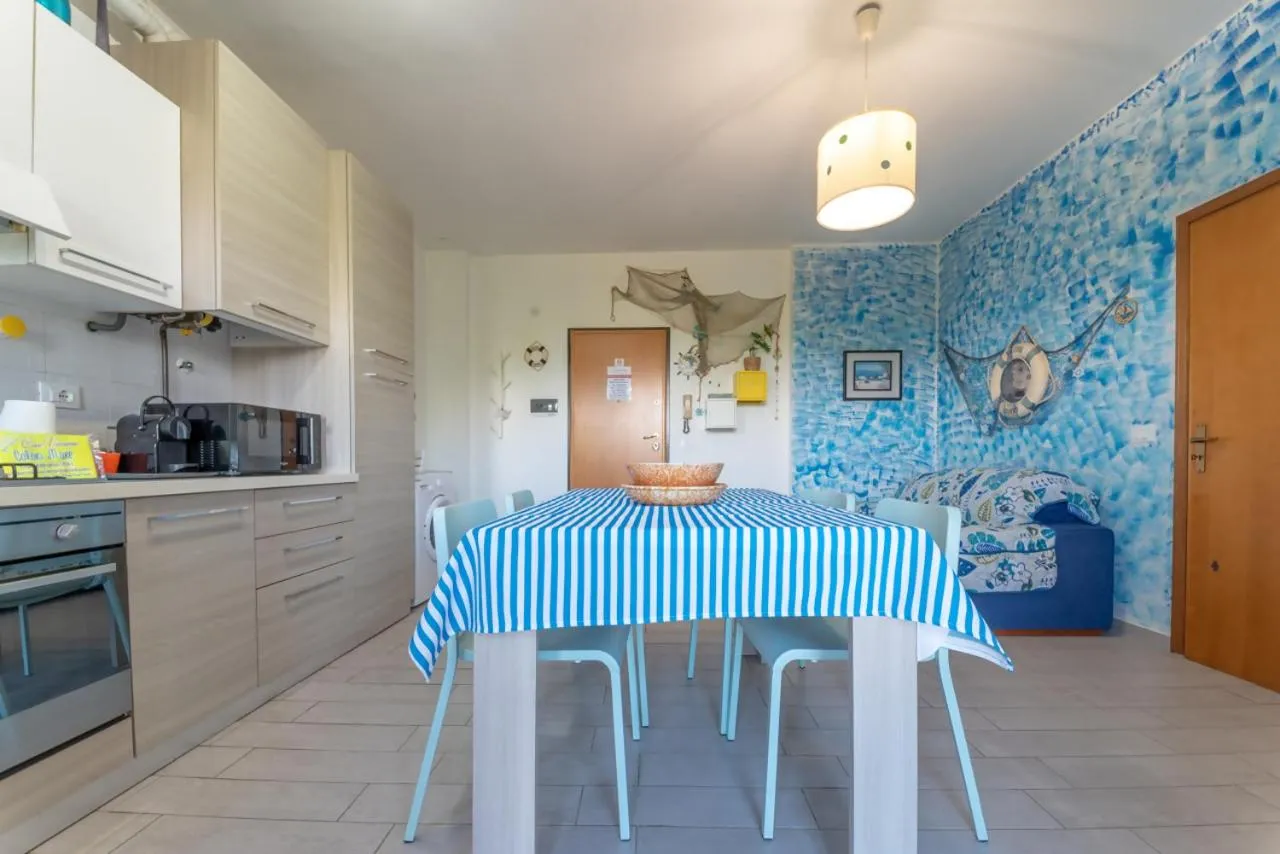 Kitchen or kitchenette in AZZURRO LIDO ADRIANO VISTA MARE