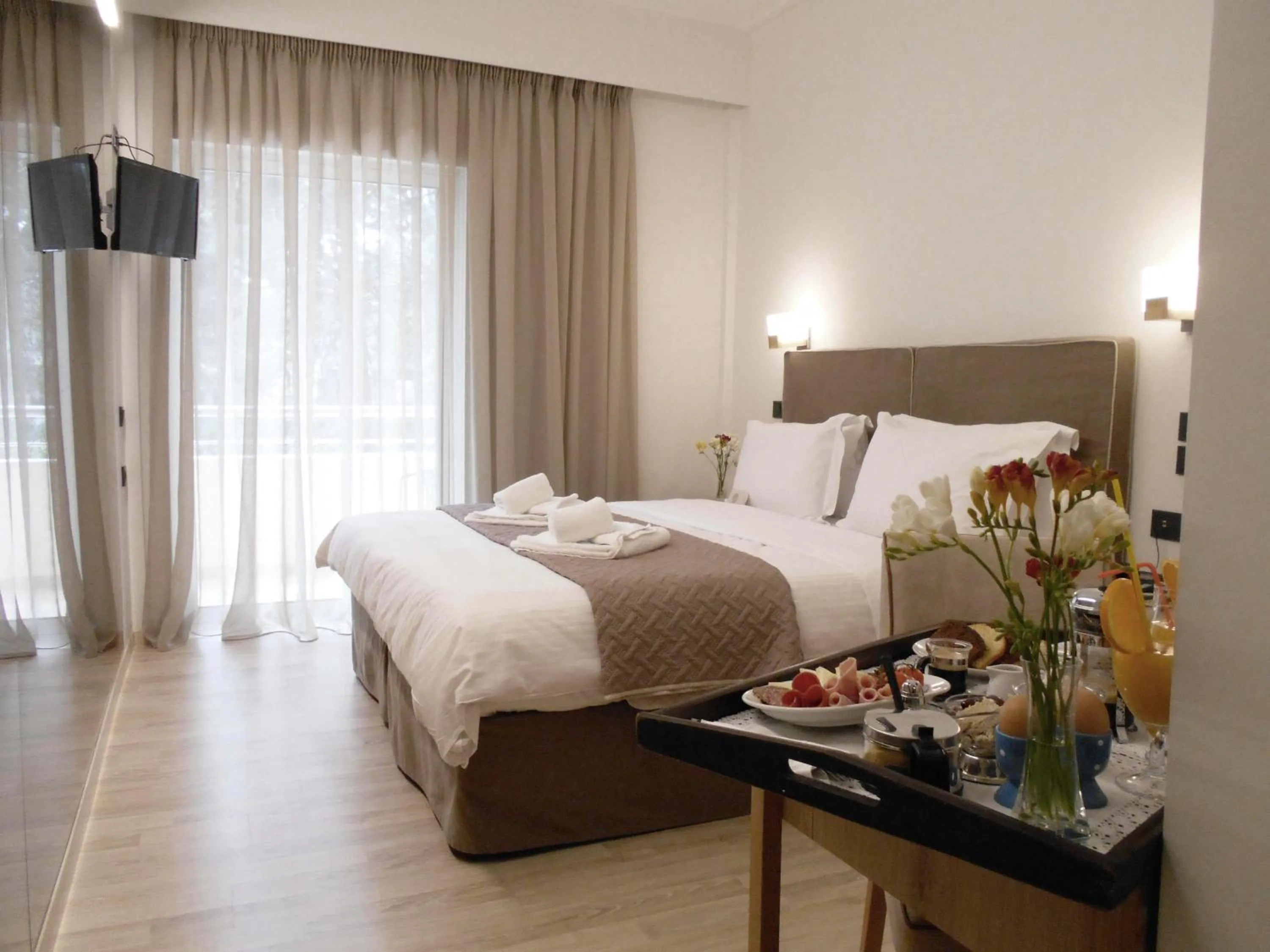 Bed in Anastazia Luxury Suites & Spa
