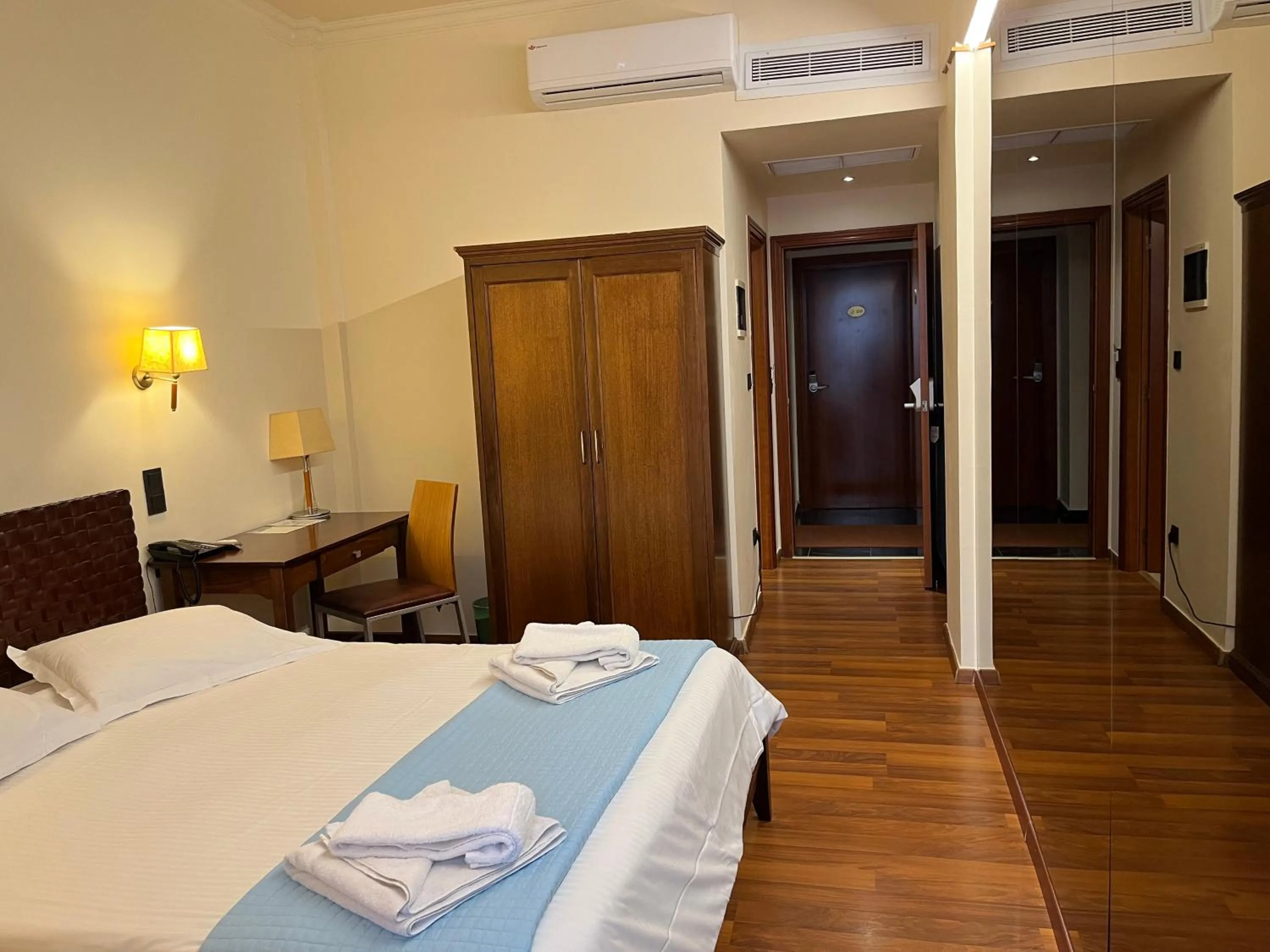 Bed in Anastazia Luxury Suites & Spa