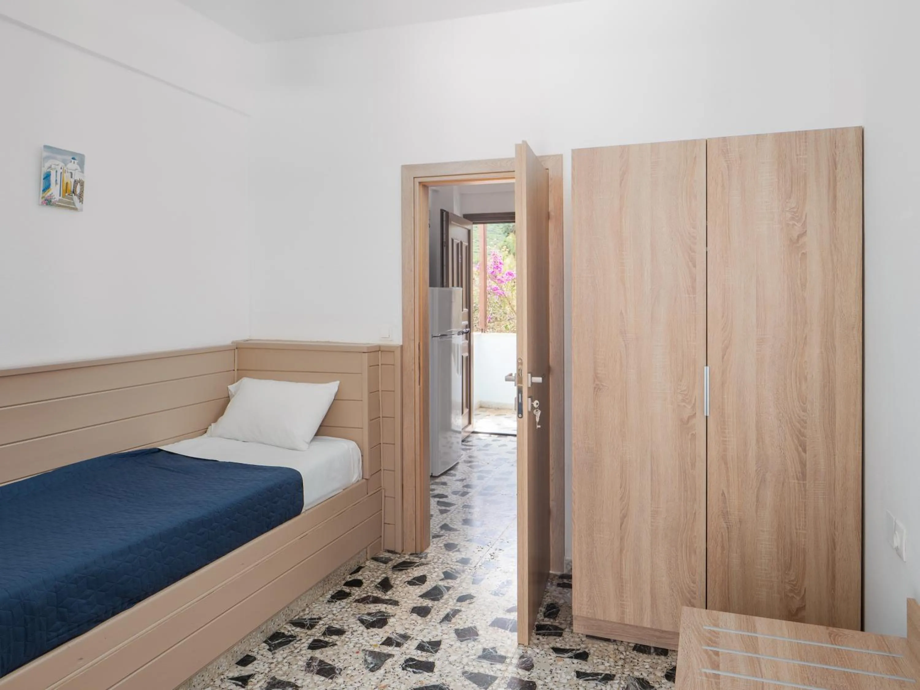 Bed in Spiros-Soula Family Hotel & Apartments