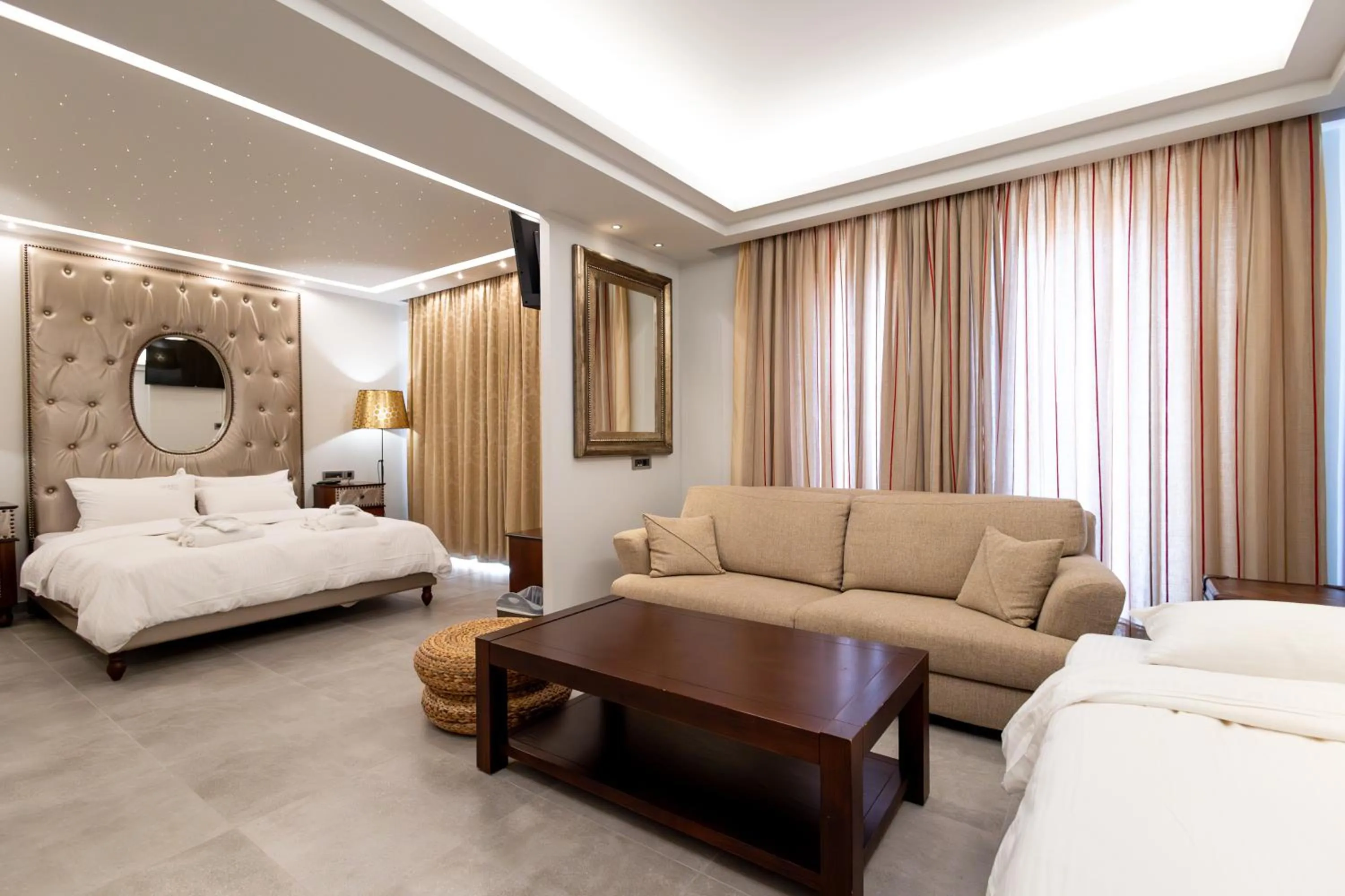 Living room, Bed in Comfy Boutique Hotel