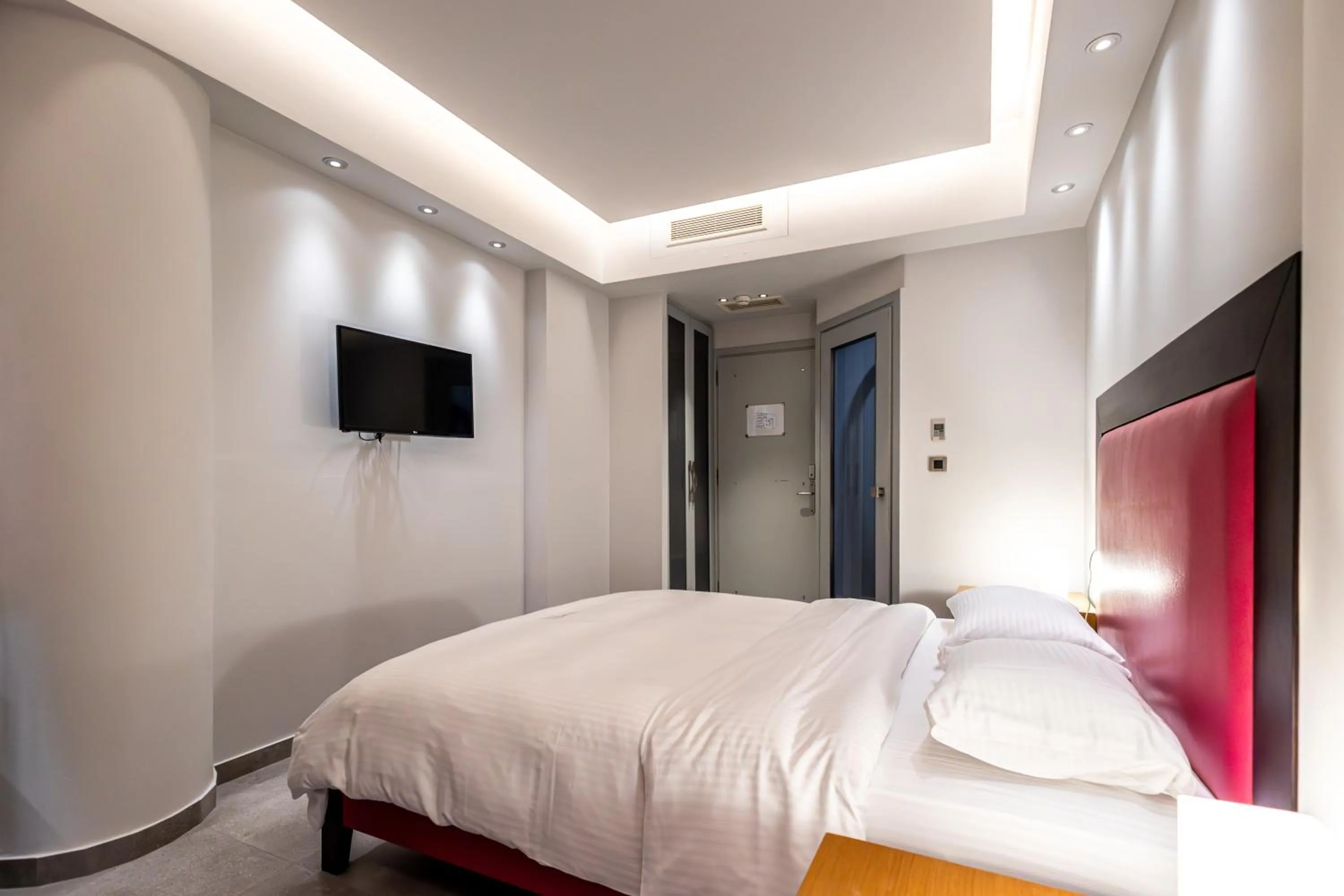 Bed in Comfy Boutique Hotel