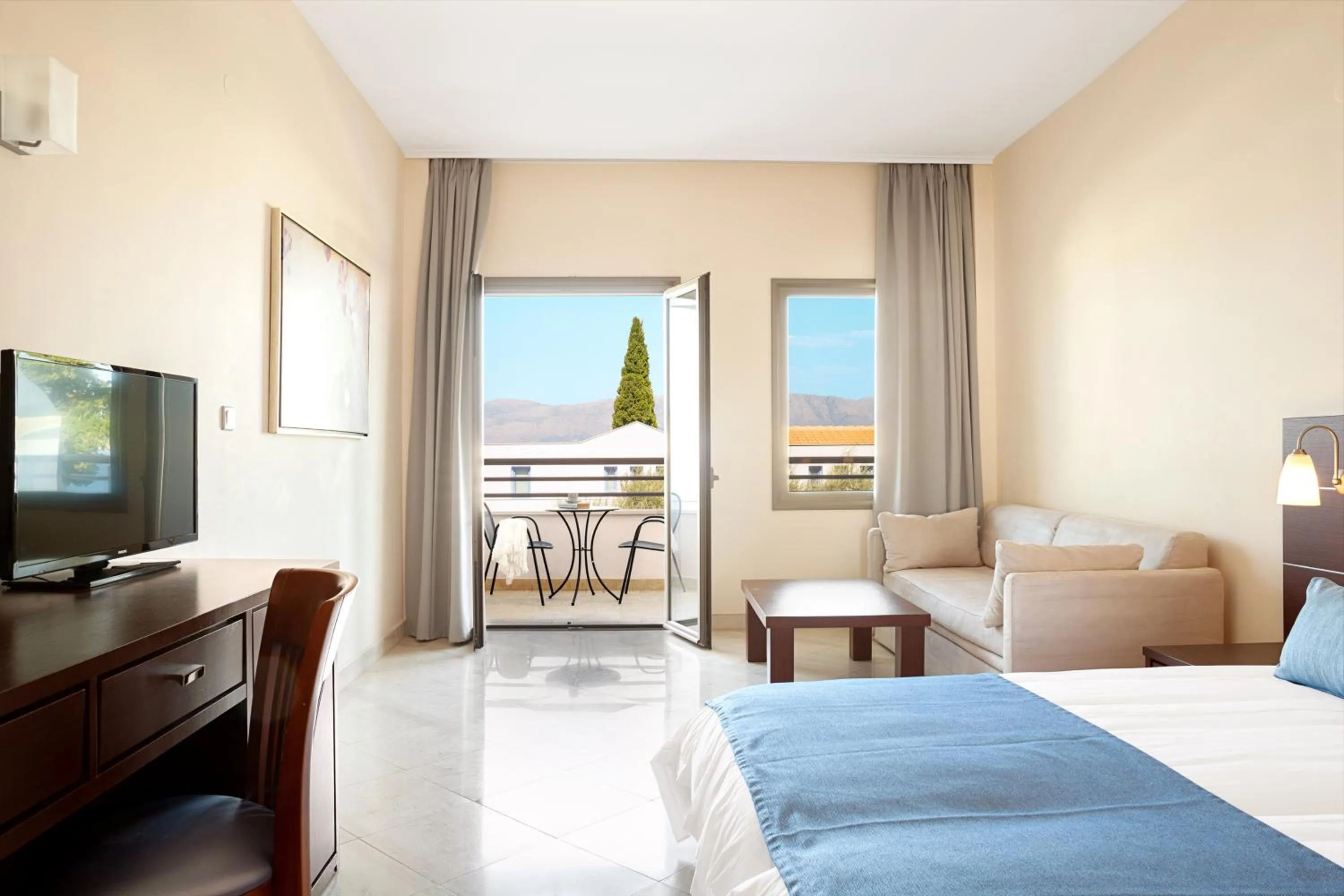 Bed in Porto Galini Seaside Resort & Spa